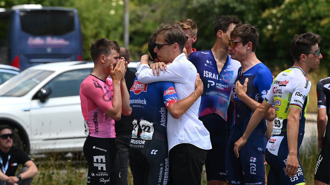 CHUR, SWITZERLAND - JUNE 16: (L-R) Stefan Bissegger of Switzerland and Team EF Education-EasyPost, Silvan Dillier of Switzerland and Team Alpecin-Deceuninck, Stefan Küng of Switzerland and Team Groupama-FDJ and Team Bahrain Victorious staff shocked by the death of Gino Mäder of Switzerland and Team Bahrain Victorious after the fall suffered in yesterday's stage prior to the 86th Tour de Suisse 2023, Stage 6 a 140.9km stage from Chur to Oberwil-Lieli 565m / Stage route modificated regarding rock avalanche in Brienz / #UCIWT / on June 16, 2023 in Chur, Switzerland. (Photo by Dario Belingheri/Getty Images)