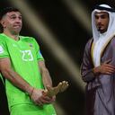 Soccer Football - FIFA World Cup Qatar 2022 - Final - Argentina v France - Lusail Stadium, Lusail, Qatar - December 18, 2022 Argentina's Emiliano Martinez reacts after receiving the Golden Glove award after the match REUTERS/Kai Pfaffenbach TPX IMAGES OF THE DAY