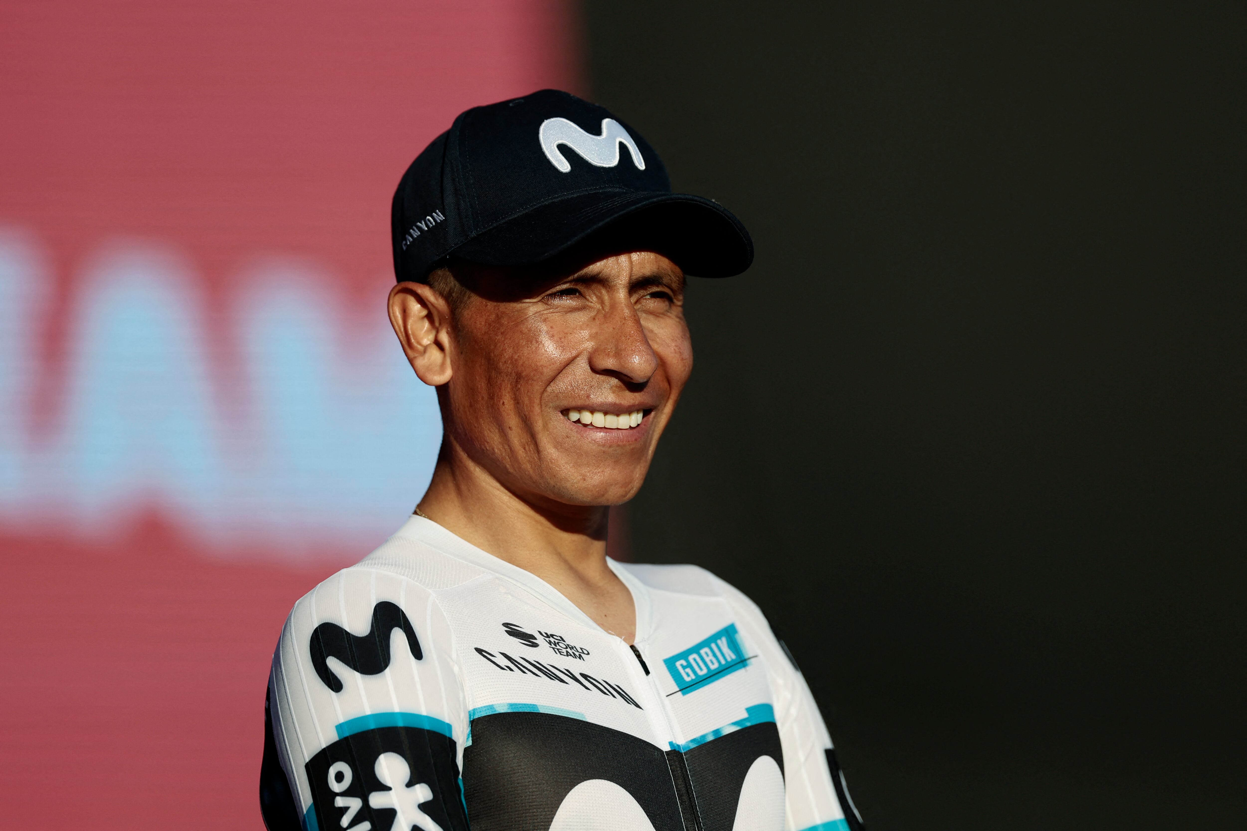 Movistar Team's Colombian rider Nairo Quintana  smiles on stage during the opening ceremony and team presentation in Tirana, on May 7, 2025, two days before the departure of the Giro d'Italia 2025 cycling race. The Giro d'Italia 2025 cycling race will depart from Durres, Albania on May 9, and finish in Rome on June 1. (Photo by Luca Bettini / AFP)