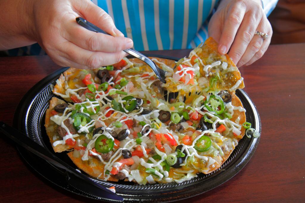 Una pizza estilo mexicano de comida Tex-Mex en Tijuana Flats