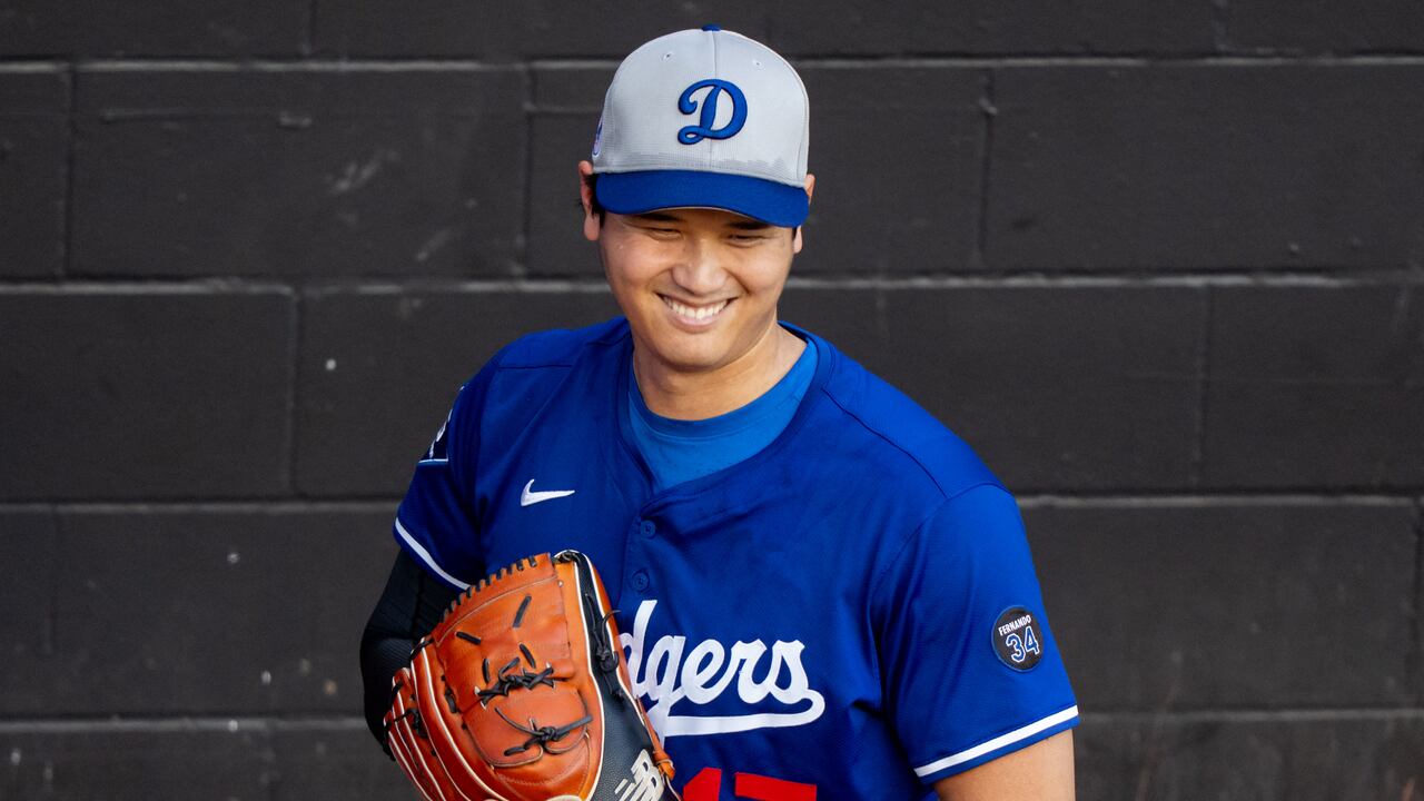 SEATTLE, WA - SEPTEMBER 27: Shohei Ohtani #17 of the Los Angeles Dodgers smiles between pitches during a bullpen session before a game against the Seattle Mariners at T-Mobile Park on September 27, 2025 in Seattle, Washington. (Photo by Stephen Brashear/Getty Images)