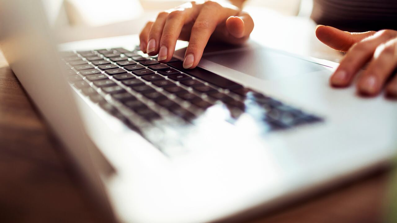 Close up of a young woman working from home