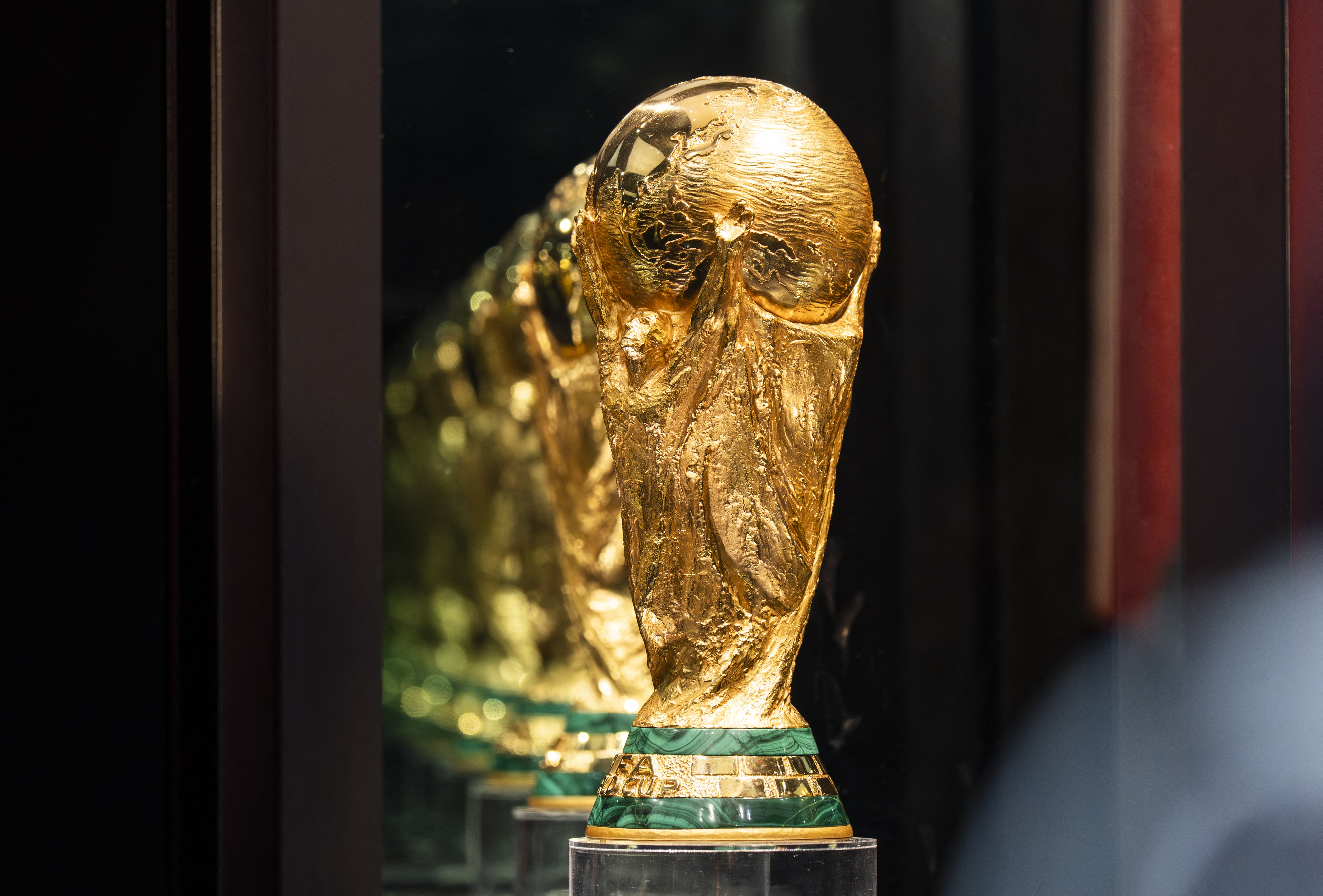 GUWAHATI, INDIA - JANUARY 13: FIFA World Cup Trophy stands on display for public inside a glass box during the Special Trophy Tour on January 13, 2026 in Guwahati, India. Ahead of the FIFA World Cup 2026, which is scheduled to kick off on June 11, the original FIFA World Cup Trophy arrived in India as part of its official global trophy tour. David Talukdar / Anadolu (Photo by David Talukdar / Anadolu via AFP)