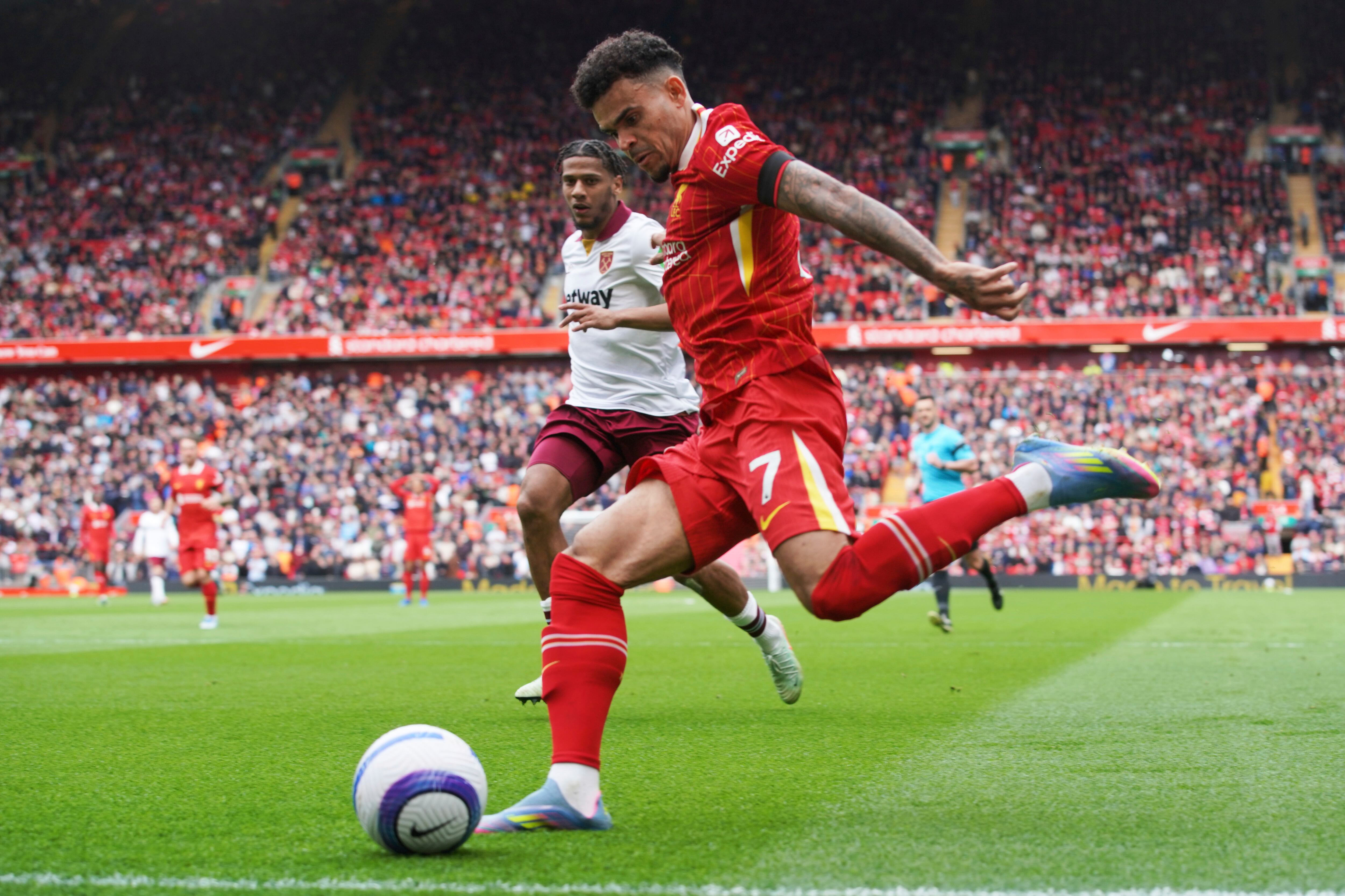 Liverpool's Luis Diaz in action during the English Premier League soccer match between Liverpool and West Ham United at Anfield in Liverpool, Sunday, April 13, 2025. (AP Photo/Ian Hodgson)