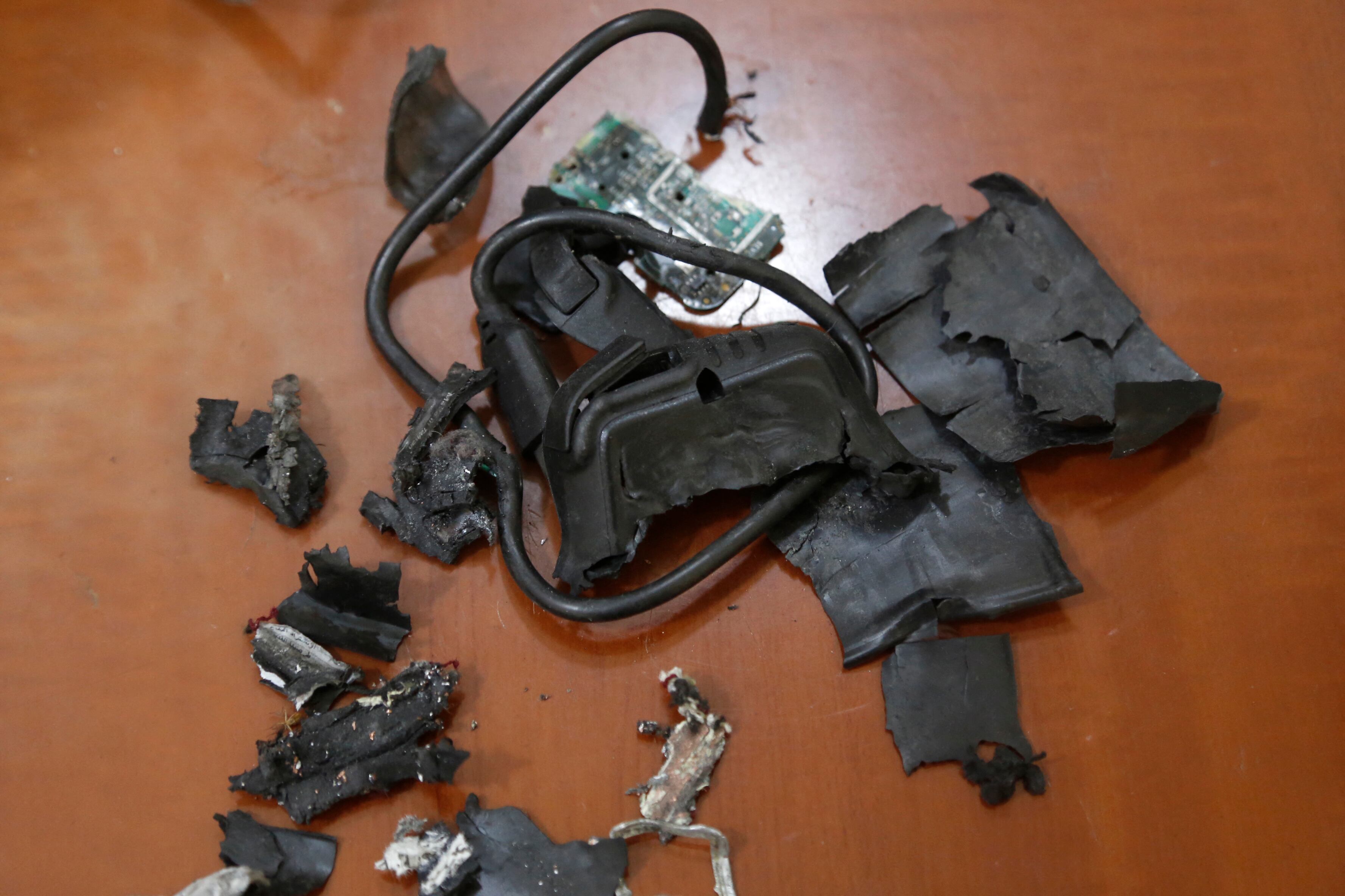 A photo taken on September 18, 2024, in Beirut's southern suburbs shows the remains of exploded pagers on display at an undisclosed location. Hundreds of pagers used by Hezbollah members exploded across Lebanon on September 17, killing at least nine people and wounding around 2,800 in blasts the Iran-backed militant group blamed on Israel. (Photo by AFP)