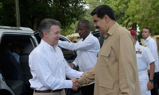 Juan Manuel Santos y Nicolás Maduro.
