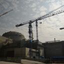 (FILES) This file photo taken on December 8, 2013 shows a view of the joint Sino-French Taishan Nuclear Power Station being built outside the city of Taishan in Guangdong province. - French nuclear firm Framatome said on June 14, 2021 it was working to resolve a "performance issue" at the plant it part-owns in China's southern Guangdong province following a US media report of a potential leak there. (Photo by PETER PARKS / AFP)