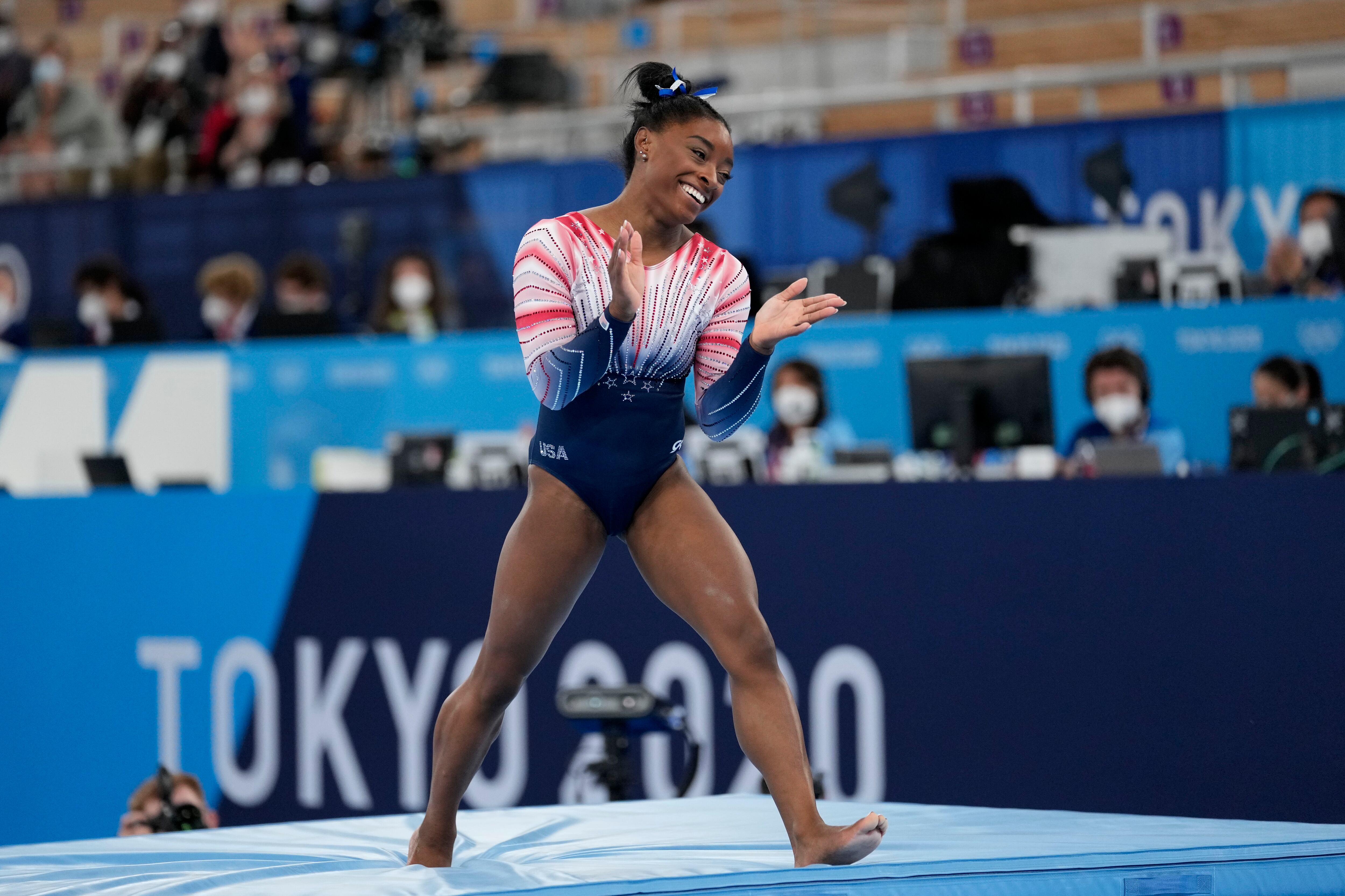 FILE - Simone Biles reacts after competing on the balance beam at the Tokyo Olympics, Tuesday, Aug. 3, 2021. USA Gymnastics announced Wednesday, June 28, 2023, that Biles, the 2016 Olympic champion, will be part of the field at the U.S. Classic outside of Chicago on Aug. 5. The meet will be Biles first since the 2020 Olympics. (AP Photo/Ashley Landis, File)
