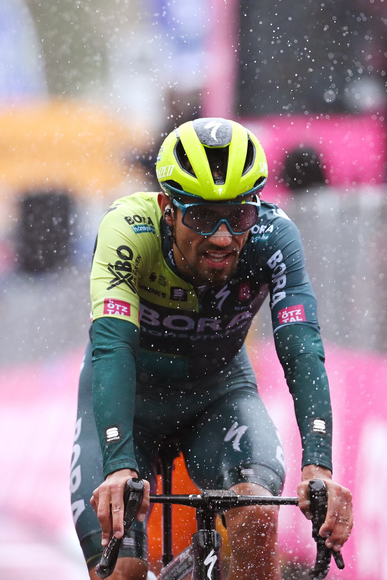 SANTA CRISTINA VALGARDENA - MONTE PANA, ITALY - MAY 21: (EDITOR'S NOTE: Alternate crop) Daniel Martinez of Colombia and Team BORA - hansgrohe crosses the finish line on third place during the 107th Giro d'Italia 2024, Stage 16 a 118.7km stage from Lasa - Laas to Santa Cristina Valgardena - Monte Pana 1625m / Route and stage modified due to adverse weather conditions / #UCIWT / on May 21, 2024 in Santa Cristina Valgardena - Monte Pana, Italy. (Photo by Dario Belingheri/Getty Images)