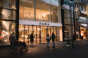 people wait for picking up in front of Zara retail store in Cologne, Germany, on January 27, 2021 amid the coronavirus pandemic. (Photo by Ying Tang/NurPhoto via Getty Images)