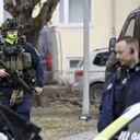 Finnish police officers investigate at the primary Viertola comprehensive school where a child opened fire and injured three other children, on April 2, 2024 in Vantaa, outside the Finnish capital Helsinki. Police said, that the attacker was in custody, and "All those involved in the shooting incident are minors". (Photo by Markku Ulander / Lehtikuva / AFP) / Finland OUT