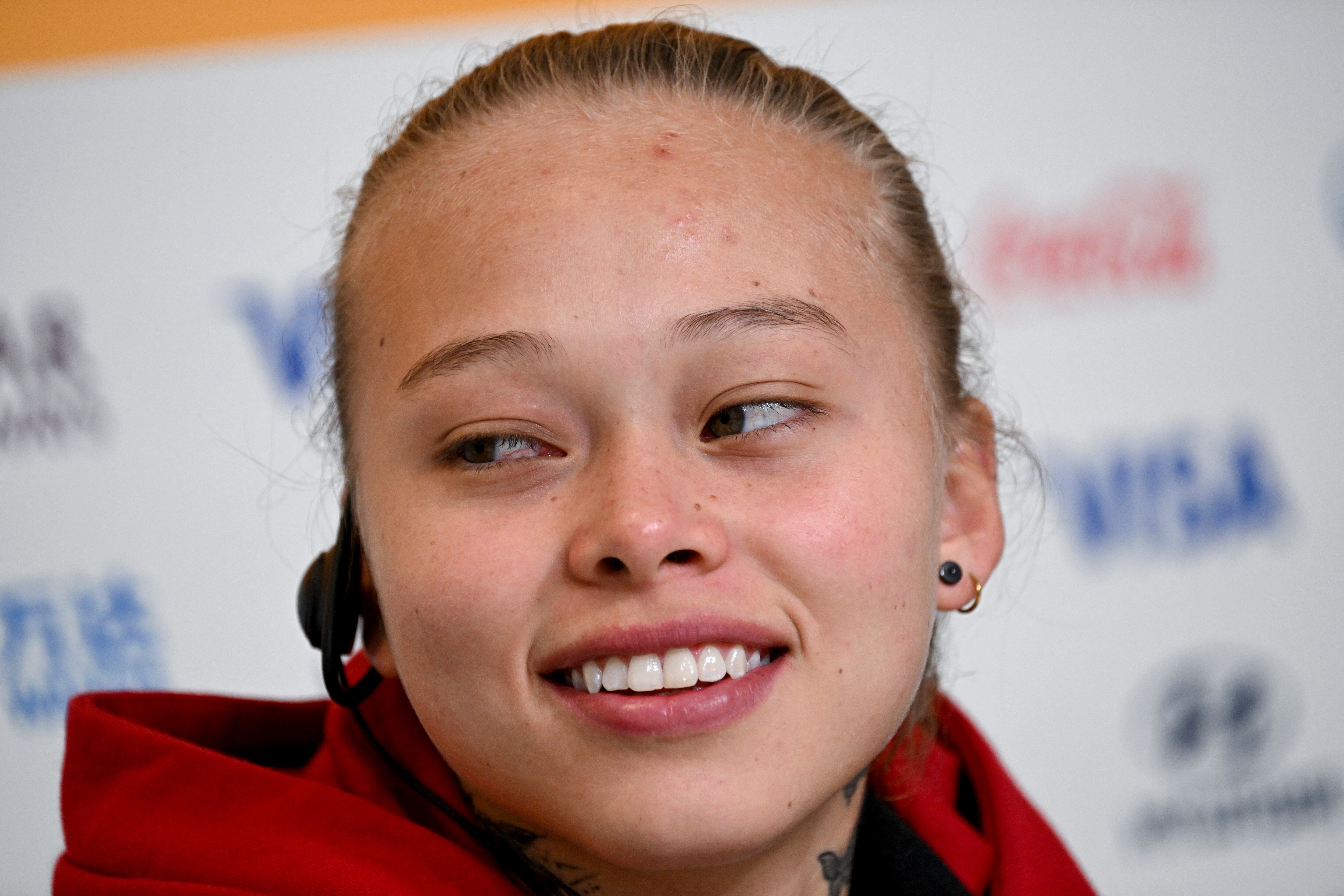 Colombia player Ana Guzman and Colombia's coach Nelson Abadia (not pictured) attend a press conference at the Rectangular Stadium in Melbourne on August 7, 2023, on the eve of the Women's World Cup round of 16 football match between Colombia and Jamaica. (Photo by William WEST / AFP)