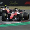 Ferrari driver Charles Leclerc of Monaco steers his car followed by Ferrari driver Lewis Hamilton of Britain during the British F1 Grand Prix, in Silverstone, England, Sunday, July 5, 2026. (AP Photo/Morgan Harlow)