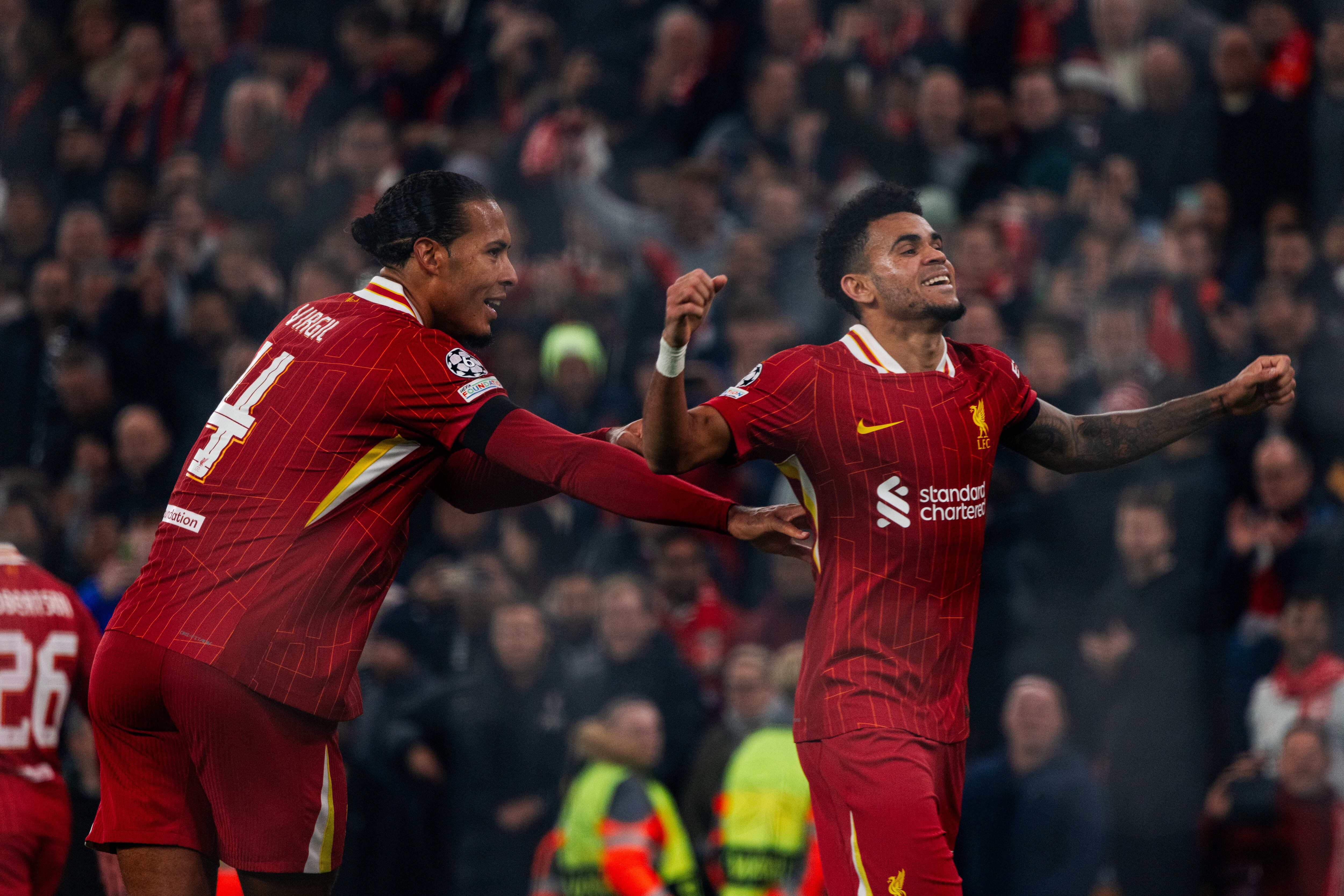 LIVERPOOL, ENGLAND - NOVEMBER 05: (THE SUN OUT, THE SUN ON SUNDAY OUT) Virgil van Dijk and Luis Díaz of Liverpool during the UEFA Champions League 2024/25 League Phase MD4 match between Liverpool FC and Bayer 04 Leverkusen at Anfield on November 05, 2024 in Liverpool, England. (Photo by Nikki Dyer - LFC/Liverpool FC via Getty Images)