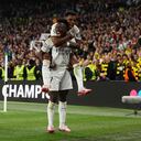 LONDON, ENGLAND - JUNE 01: Vinicius Junior of Real Madrid celebrates scoring his team's second goal with teammate Rodrygo during the UEFA Champions League 2023/24 Final match between Borussia Dortmund and Real Madrid CF at Wembley Stadium on June 01, 2024 in London, England. (Photo by Lars Baron/Getty Images)