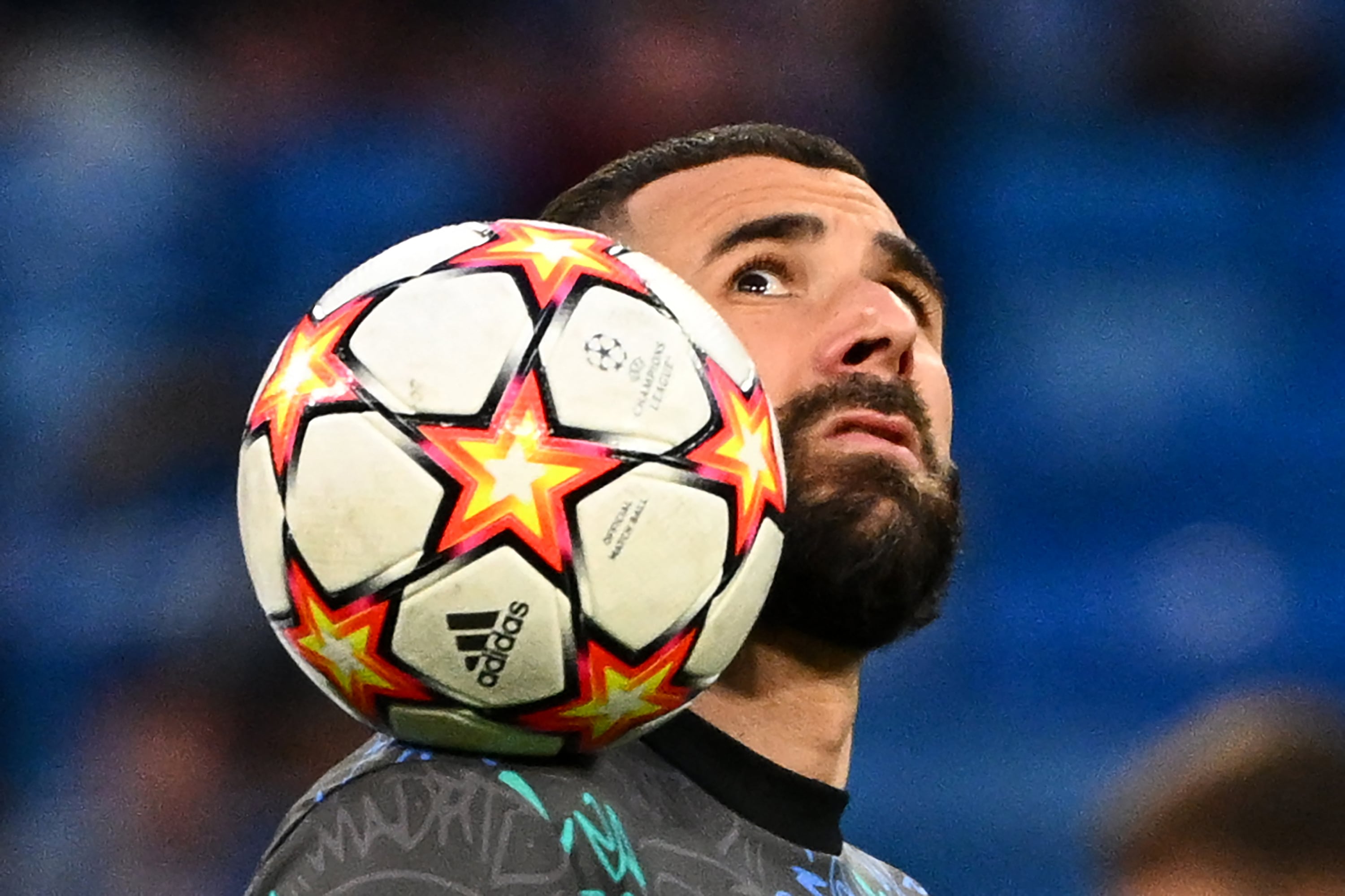 eal Madrid's French forward Karim Benzema warms up before the start of the UEFA Champions League semi-final second leg football match between Real Madrid CF and Manchester City at the Santiago Bernabeu stadium in Madrid on May 4, 2022. (Photo by GABRIEL BOUYS / AFP)
