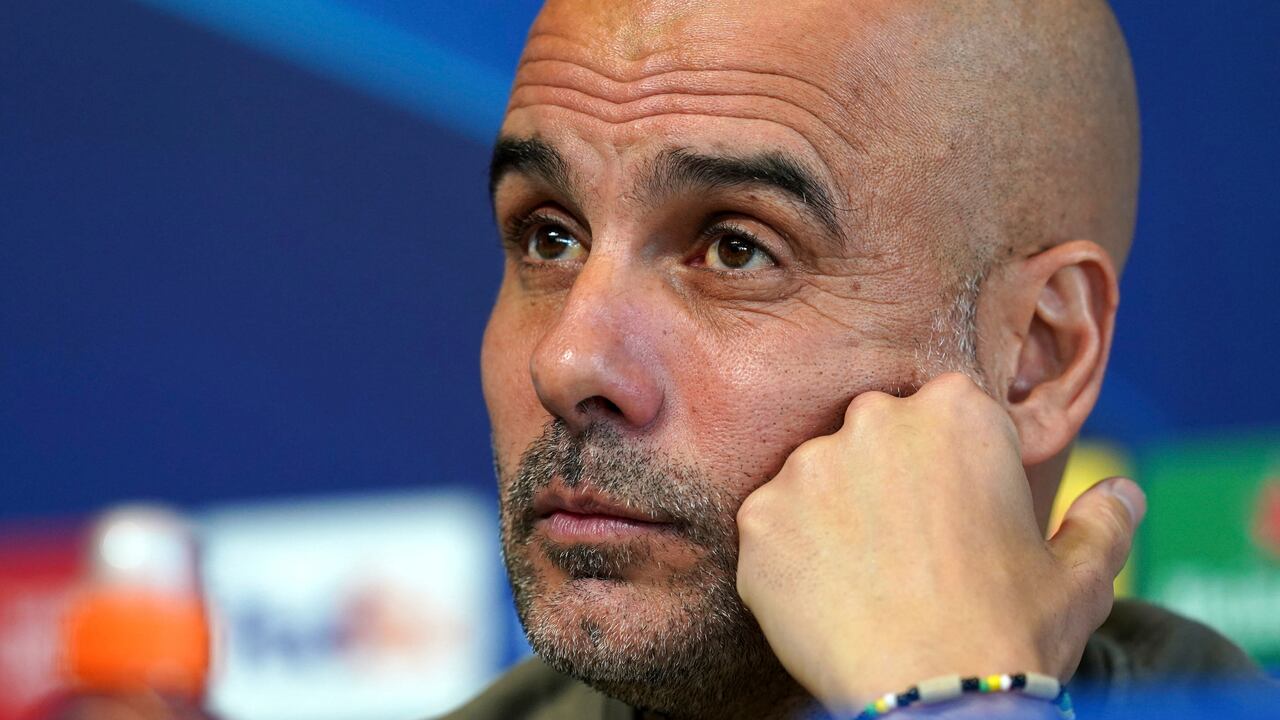 Manchester City manager Pep Guardiola meets the media during a press conference ahead of Wednesday's Champions League, semifinal, return-leg soccer match against Real Madrid, at City Football Academy, Manchester, England, Tuesday May 16, 2023. (Martin Rickett/PA via AP)
