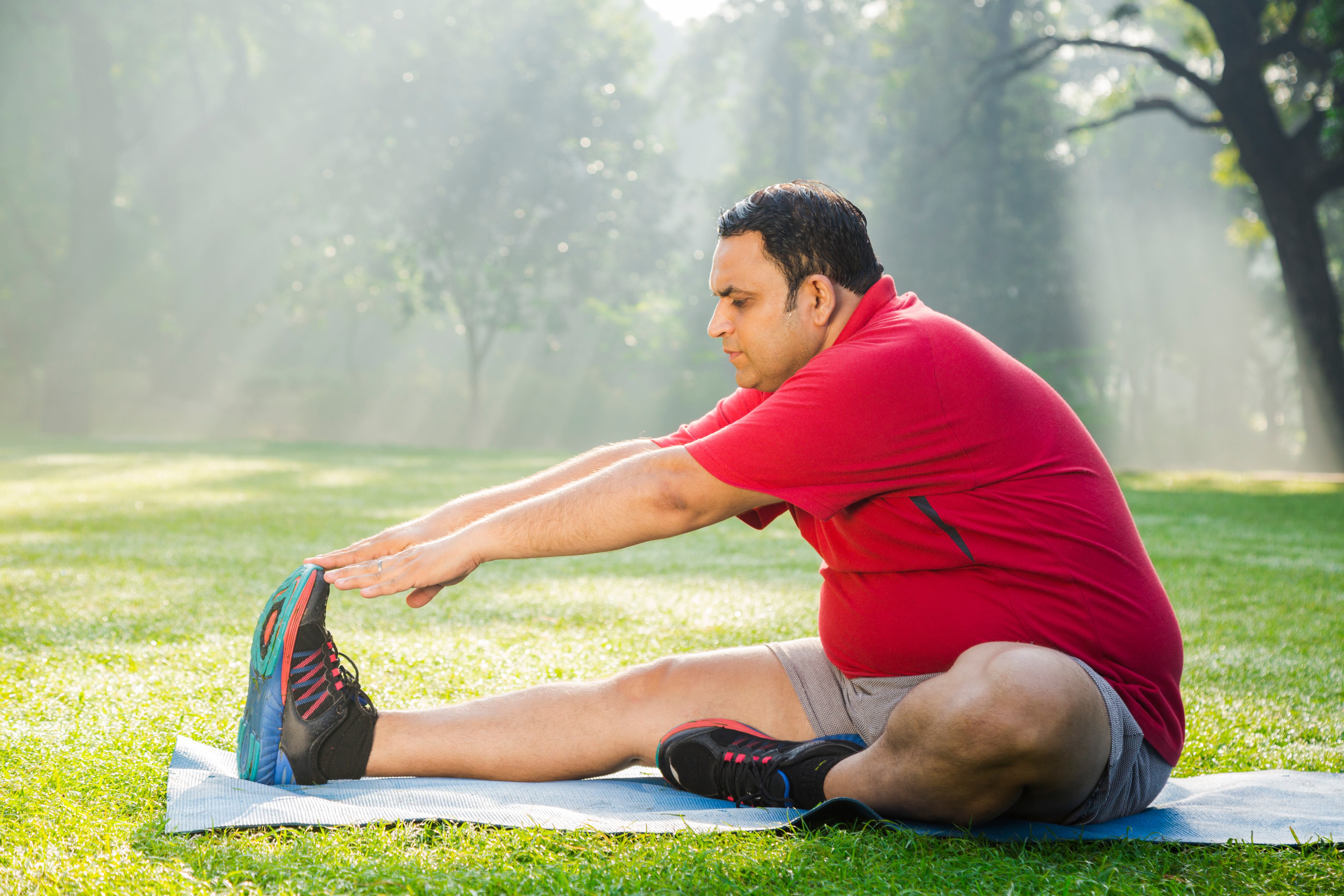 Mature man workout in park