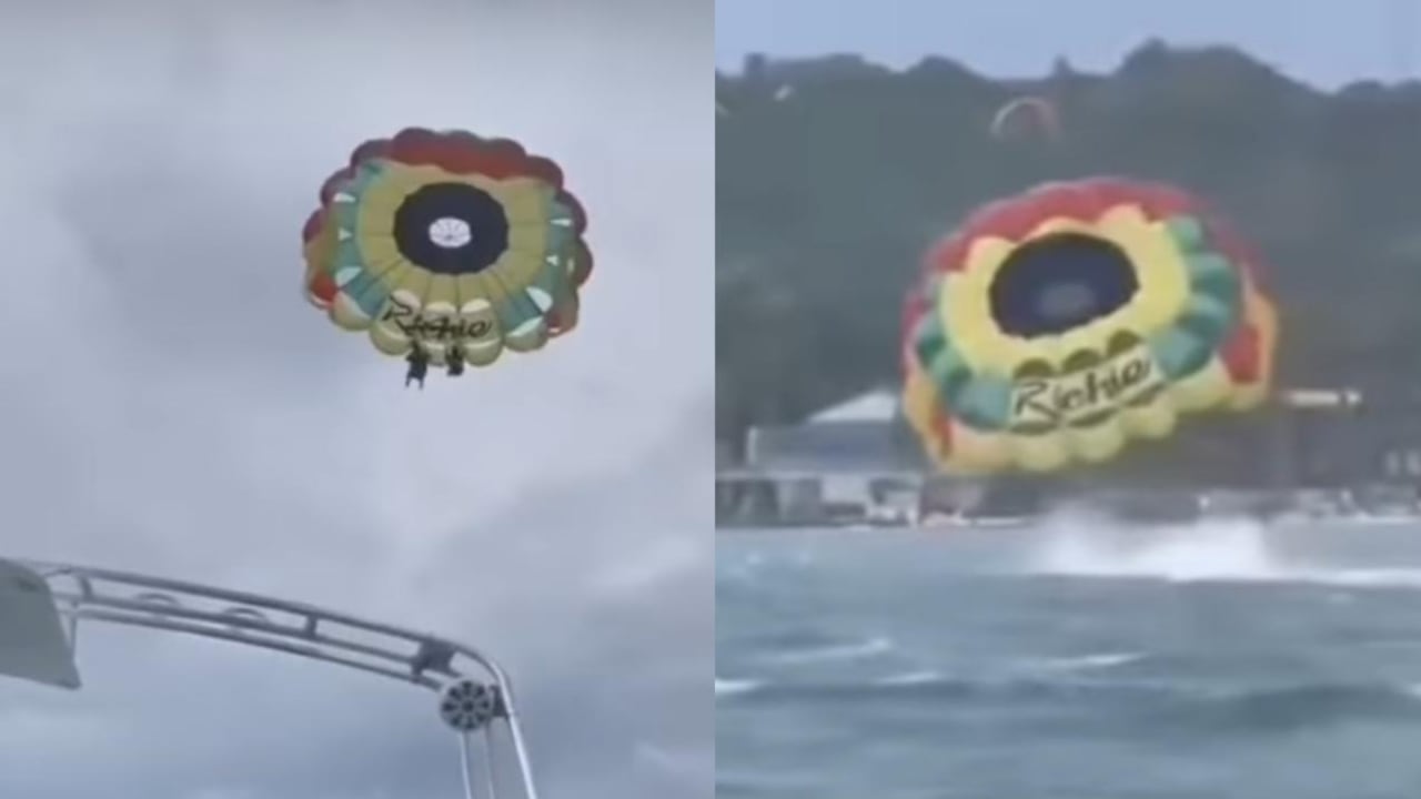 El video muestra el momento en que la cuerda que sostenía a los dos turistas se rompe, arrastrándolos hacia la costa.