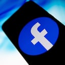In this photo illustration Facebook logo is displayed on a smartphone screen. (Photo Illustration by Nikolas Kokovlis/NurPhoto via Getty Images)