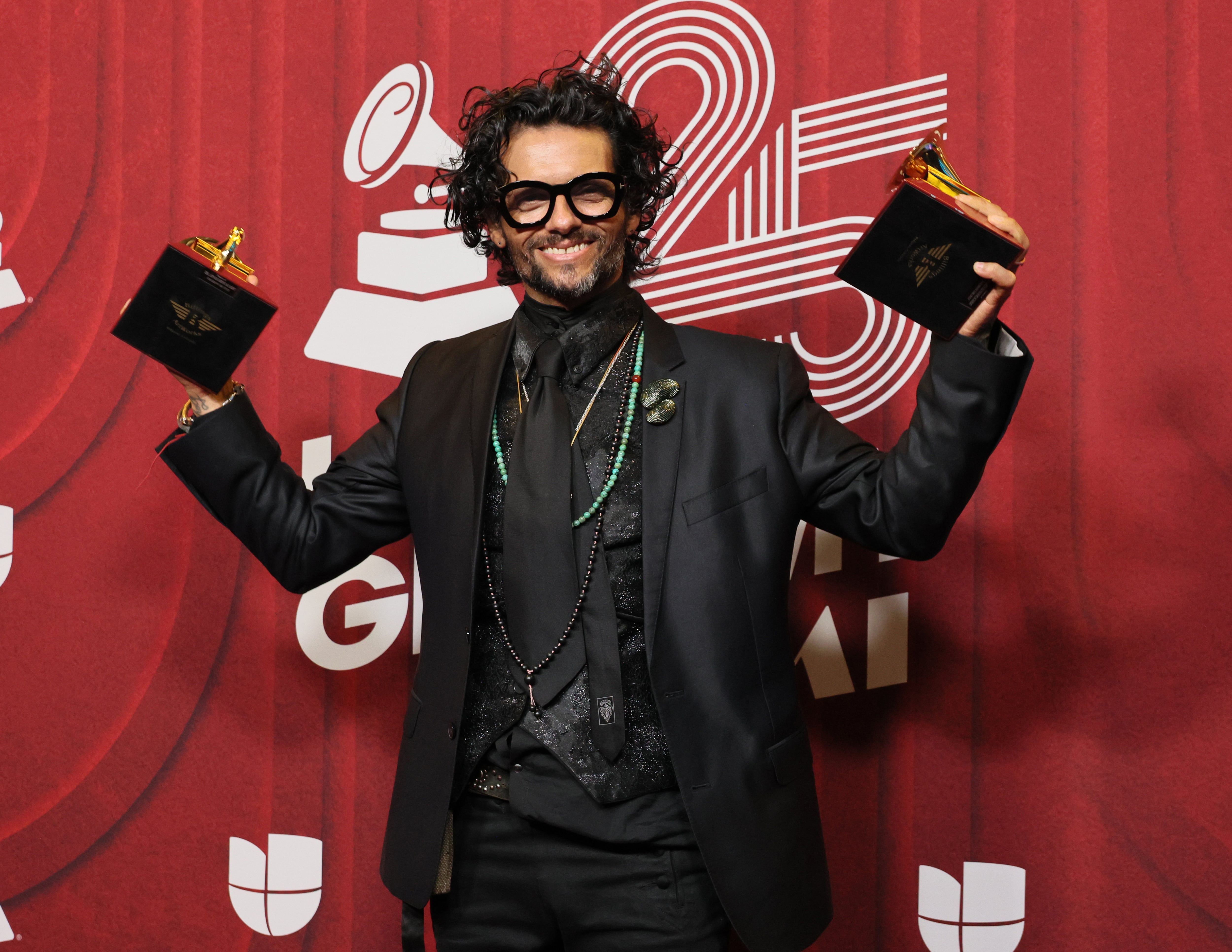 Draco Rosa, winner of the Best Pop/Rock Album for "Reflejos De Lo Eterno" and the Best Rock Song award for "No Me Preguntes (Live)" poses in the press room during the 25th Annual Latin GRAMMY Awards at Kaseya Center on November 14, 2024 in Miami, Florida. (Photo by Dia Dipasupil/Getty Images)