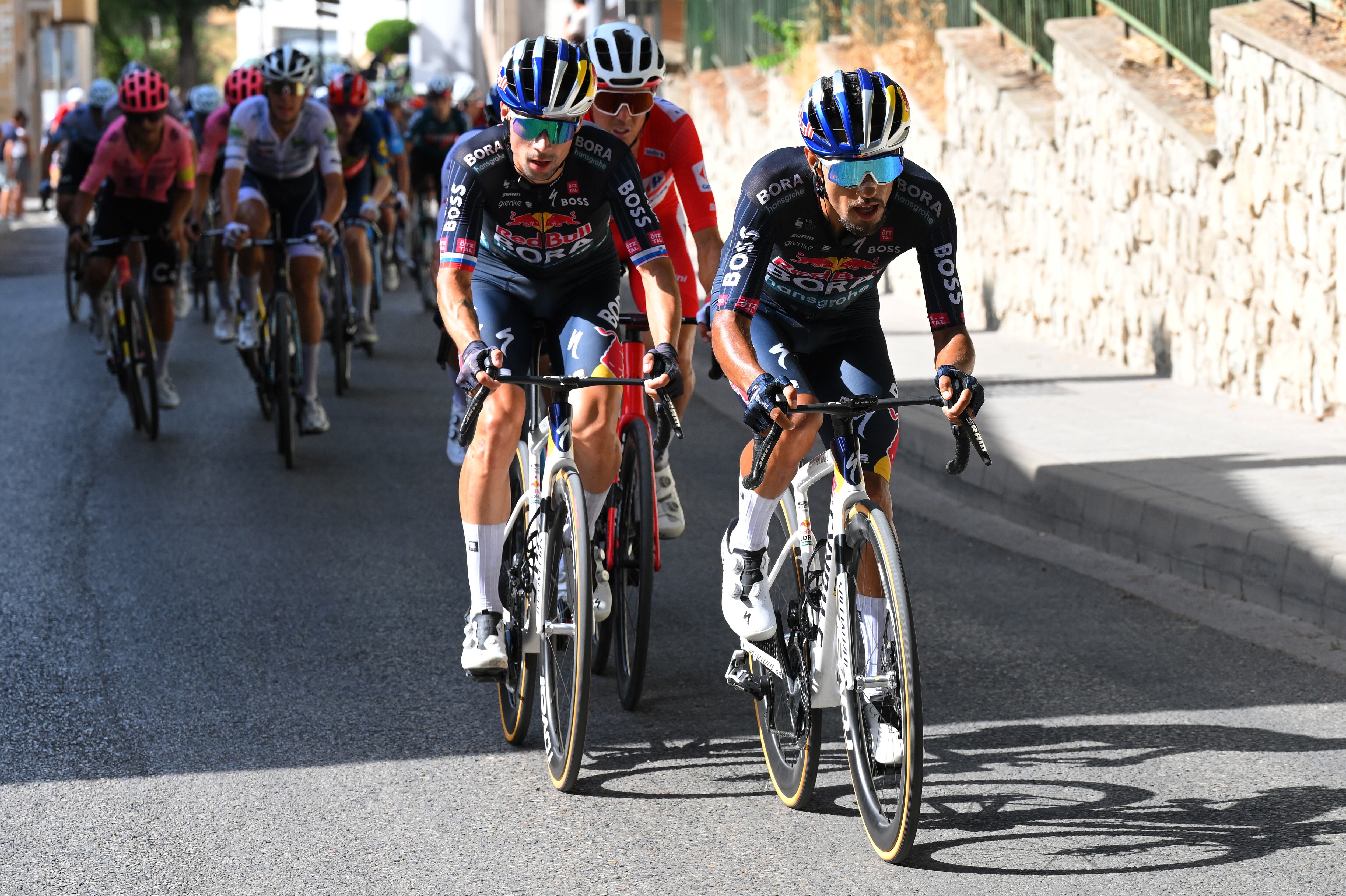 CAZORLA, SPAIN - AUGUST 24: (L-R) Primoz Roglic of Slovenia and Daniel Martinez of Colombia and Team Red Bull Bora - hansgrohe compete during the La Vuelta - 79th Tour of Spain 2024, Stage 8 a159km stage from Ubeda to Cazorla 1056m / #UCIWT / on August 24, 2024 in Cazorla, Spain. (Photo by Tim de Waele/Getty Images)
