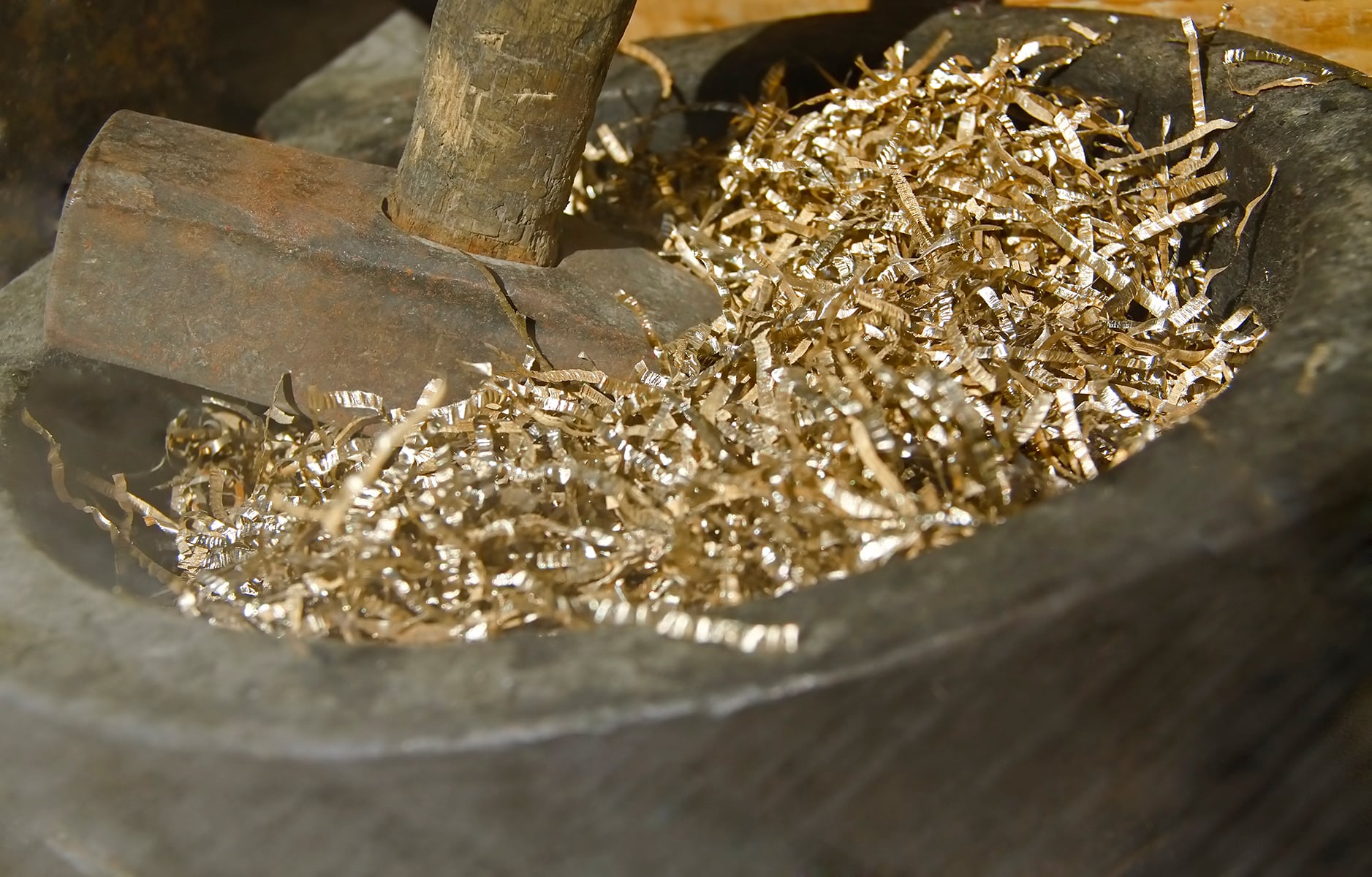 Traditional metal workshop with rusty hammer