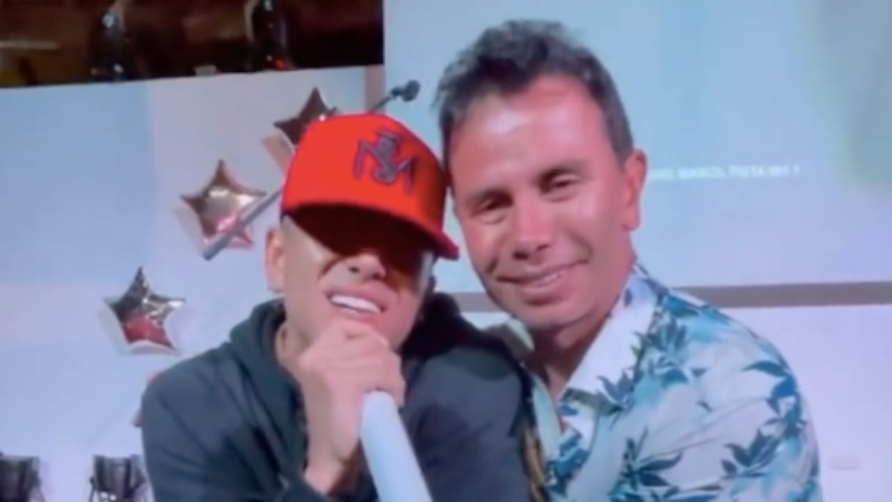 Andy junto a su padre Jhonny Rivera