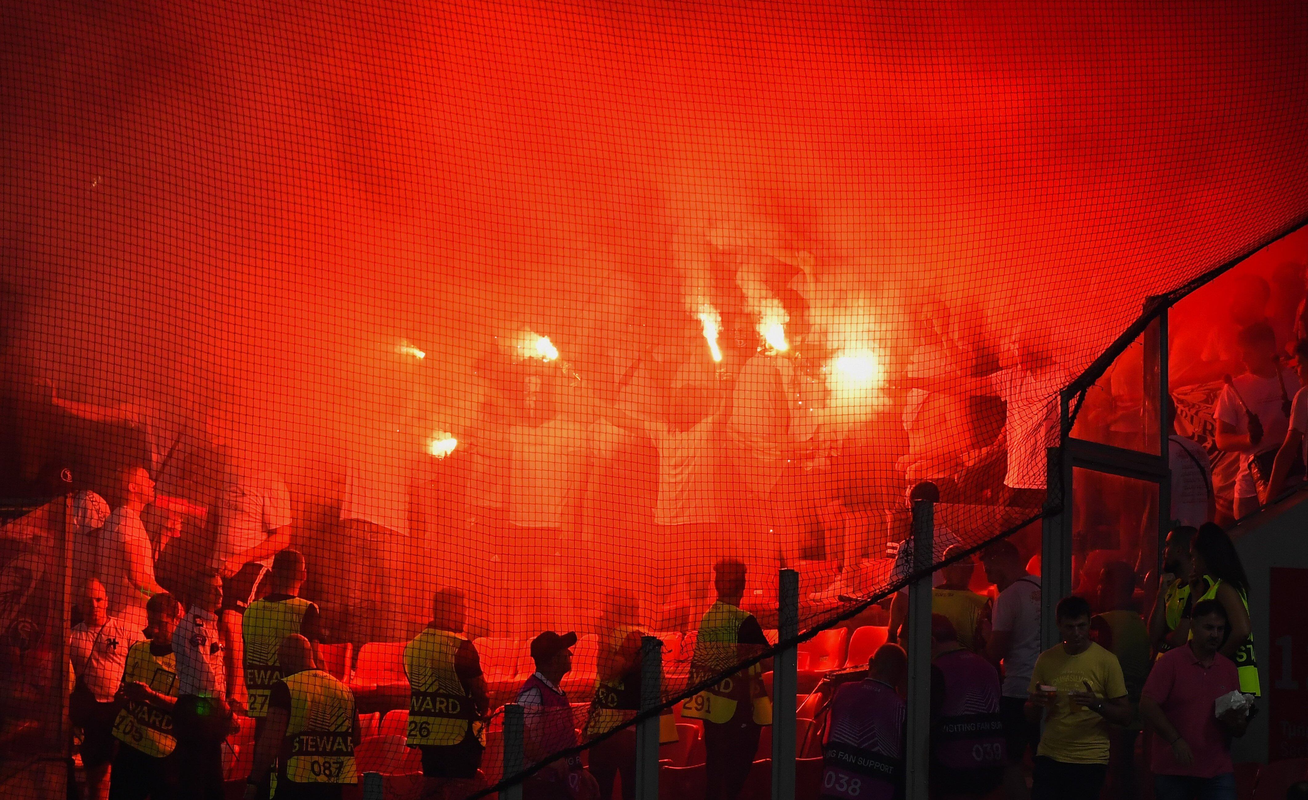 15 September 2022, Greece, Athen: Soccer: Europa League, Group stage, Group D, Matchday 2. Olympiakos Piraeus - SC Freiburg at Georgios Karaiskakis Stadium. Freiburg fans set off pyrotechnics. Photo: Angelos Tzortzinis/dpa (Photo by Angelos Tzortzinis/picture alliance via Getty Images)