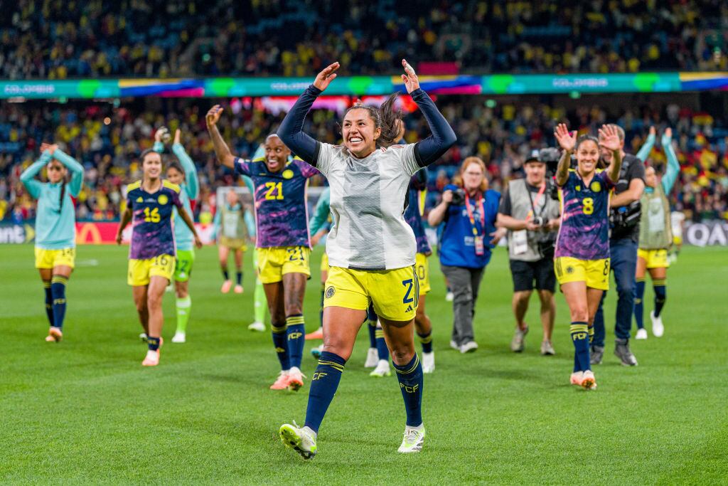 SYDNEY, AUSTRALIA - JULY 30: Manuela Vanegas (C), Lady Andrade (2nd L),  Ivonne Chacón (3rd L) and Marcela Restrepo (R) of Columbia celebrate victory during the FIFA Women's World Cup Australia & New Zealand 2023 Group H match between Germany and Colombia at Sydney Football Stadium on July 30, 2023 in Sydney, Australia. (Photo by Andy Cheung/Getty Images)