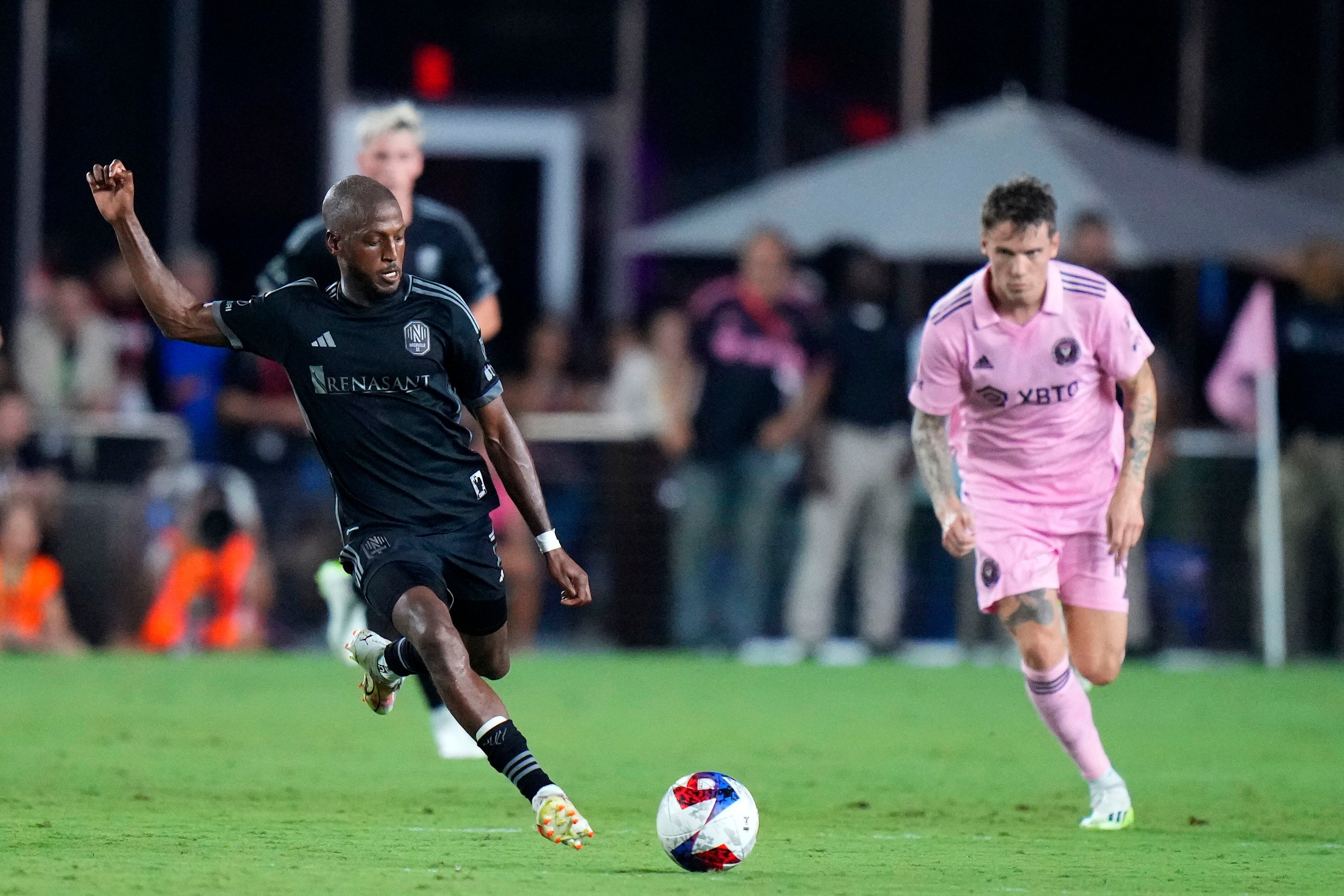 Aug 30, 2023; Fort Lauderdale, Florida, USA; Nashville SC midfielder Fafa Picault (7) kicks the ball past Inter Miami during the second half at DRV PNK Stadium. Mandatory Credit: Rich Storry-USA TODAY Sports