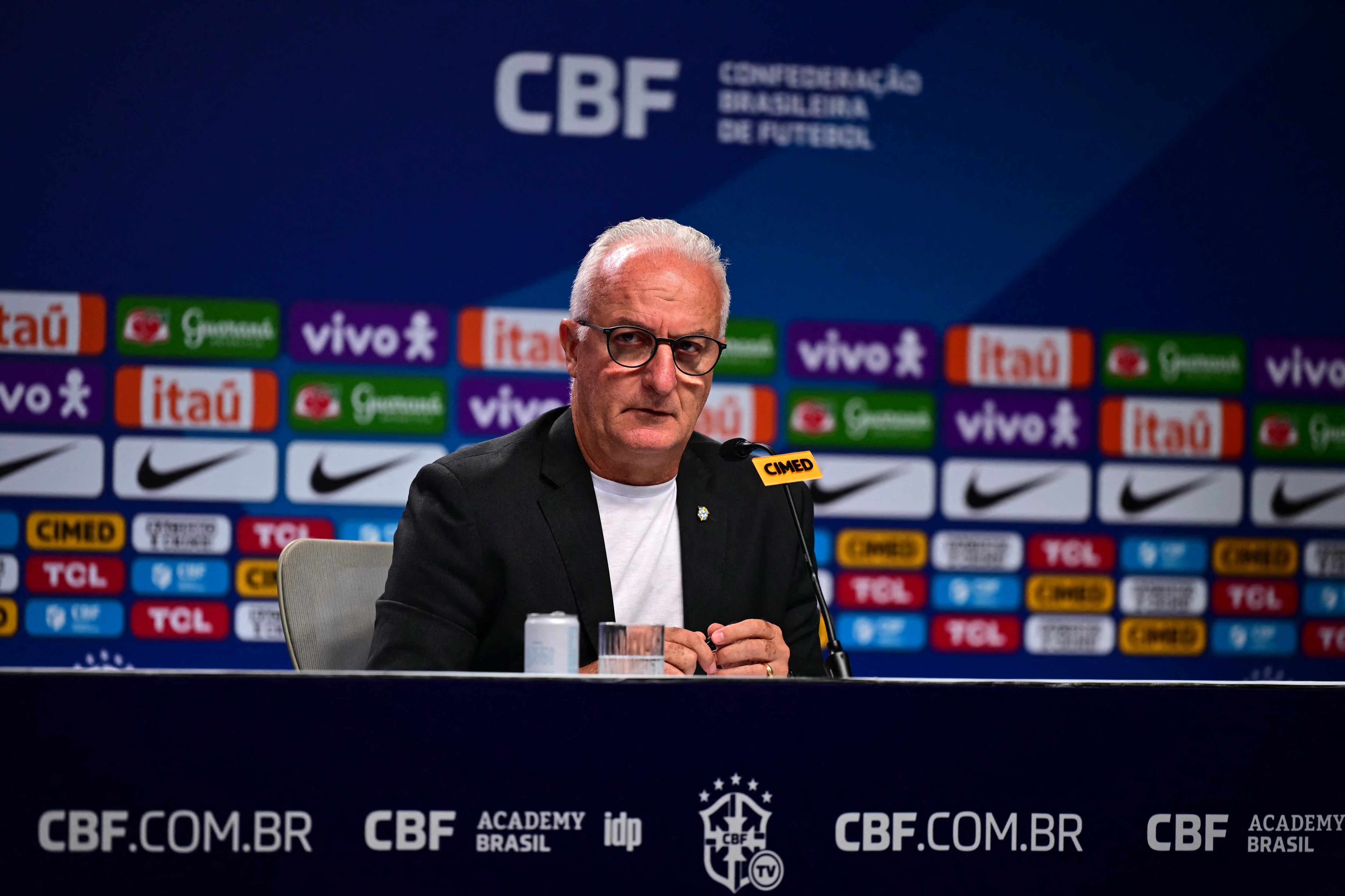 Brazil's national football team head coach Dorival Junior looks on during a press conference in Rio de Janeiro, Brazil, on March 5, 2025. Brazil's national football team head coach, Dorival Junior, named the squad that will participate in the upcoming World Cup qualifying matches against Colombia and Argentina. (Photo by Pablo PORCIUNCULA / AFP)
