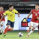 BARRANQUILLA, COLOMBIA - SEPTEMBER 09: Juan Quintero of Colombia competes for the ball with Charles Aránguiz of Chile during a match between Colombia and Chile as part of South American Qualifiers for Qatar 2022 at Estadio Metropolitano on September 09, 2021 in Barranquilla, Colombia. (Photo by Gabriel Aponte/Getty Images)