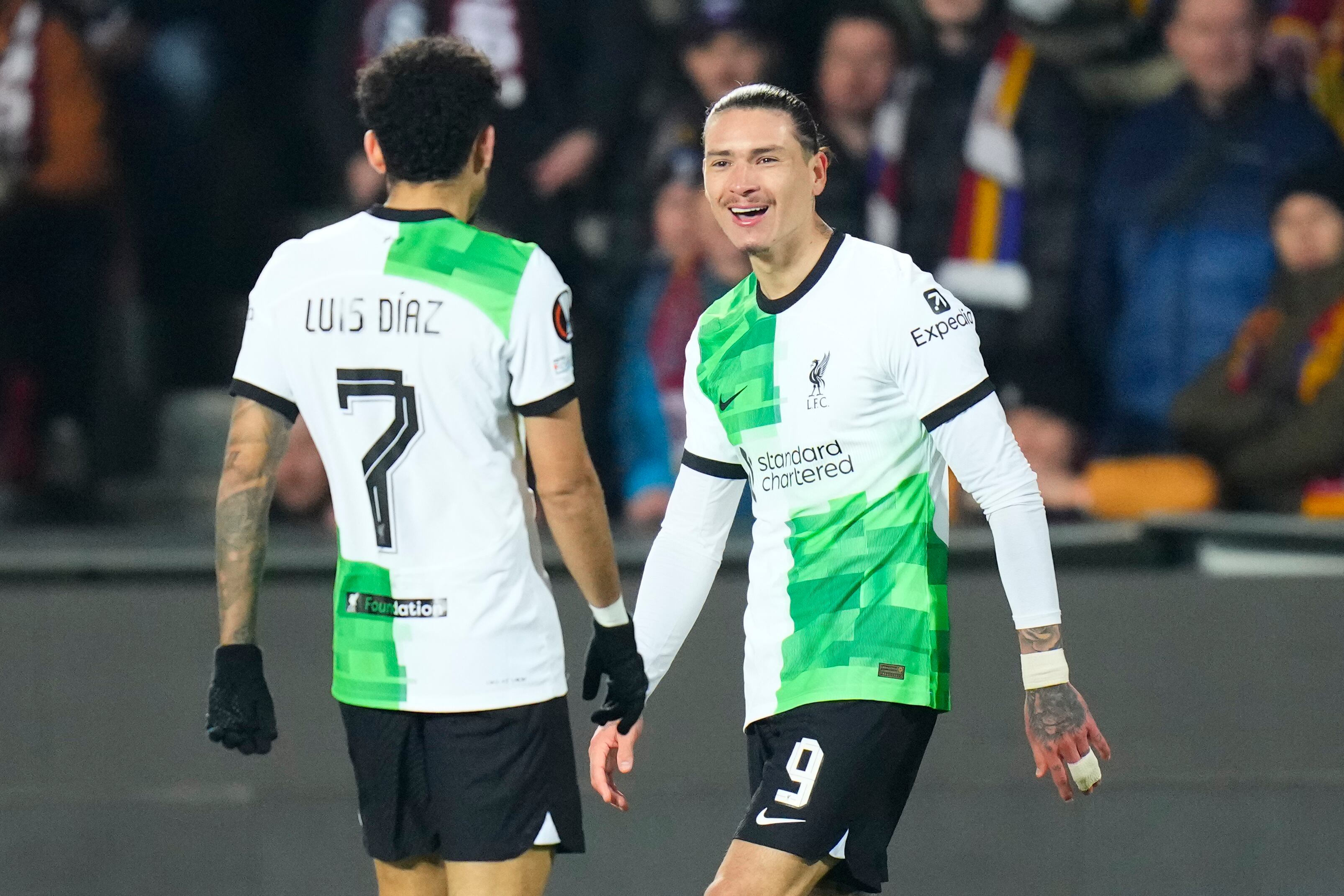 Liverpool's Darwin Nunez, right celebrates with teammates after scoring his sides second goal during the Europa League round of 16 first leg, soccer match between Sparta Praha and Liverpool at the Epet Arena in Prague, Czech Republic, Thursday, March 7, 2024. (AP Photo/Petr David Josek)