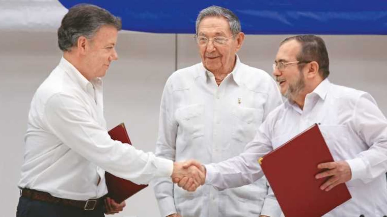 Juan Manuel Santos y Timochenko.