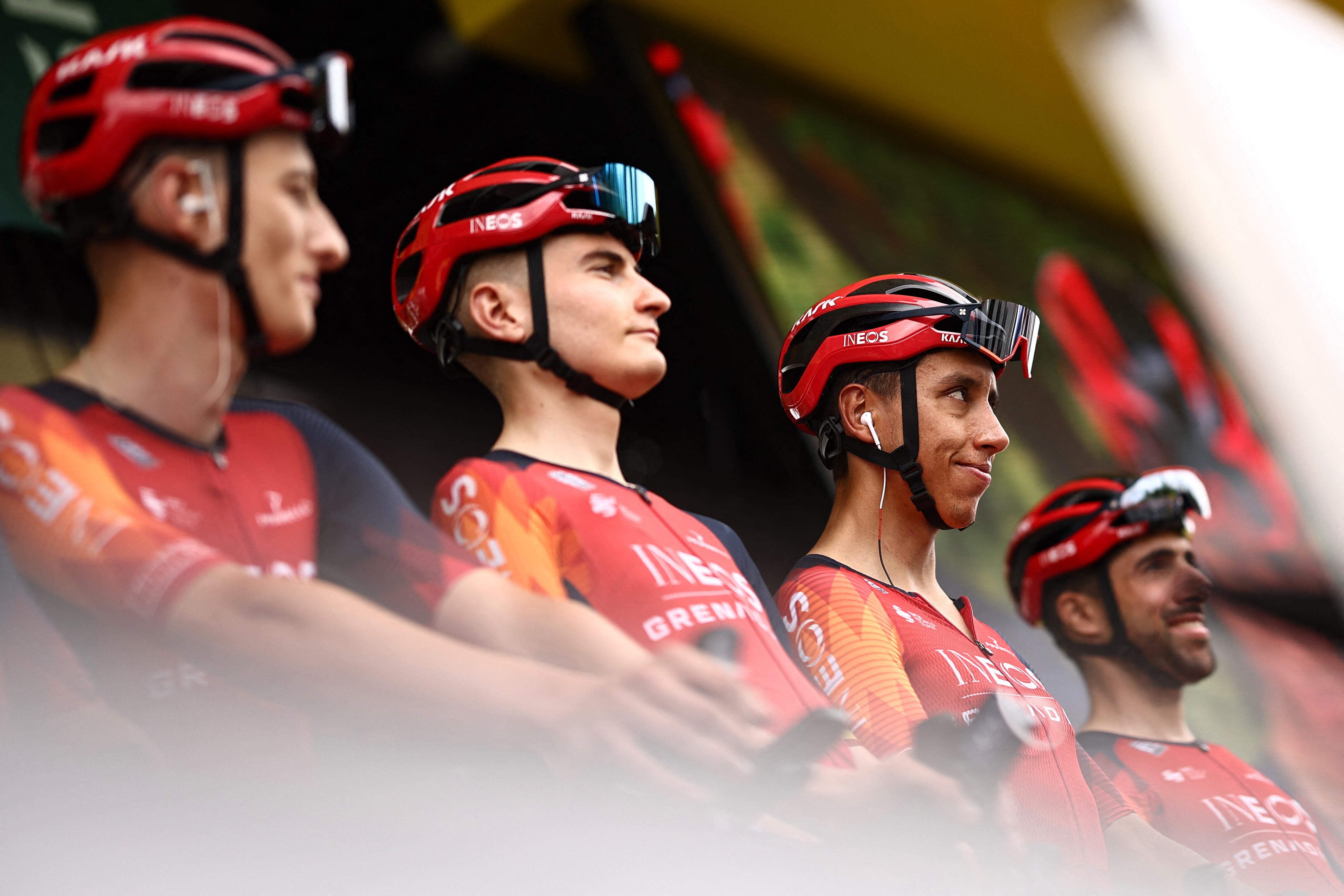 INEOS - Grenadiers' Colombian rider Egan Bernal (2nd R) and teammates take to the stage before the start of the 2nd stage of the 110th edition of the Tour de France cycling race 208,9 km between Vitoria-Gasteiz and San Sebastian, in northern Spain, on July 2, 2023. (Photo by Anne-Christine POUJOULAT / AFP)
