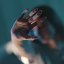 Woman doing a stop sign with her hand, women protection concept