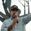 El presidente venezolano, Nicolás Maduro, hace un gesto a los miembros jóvenes del Partido Socialista Unido durante un evento que marca el ala juvenil del 16 aniversario del partido en Caracas, Venezuela, el jueves 12 de septiembre de 2024. (Foto AP/Ariana Cubillos)