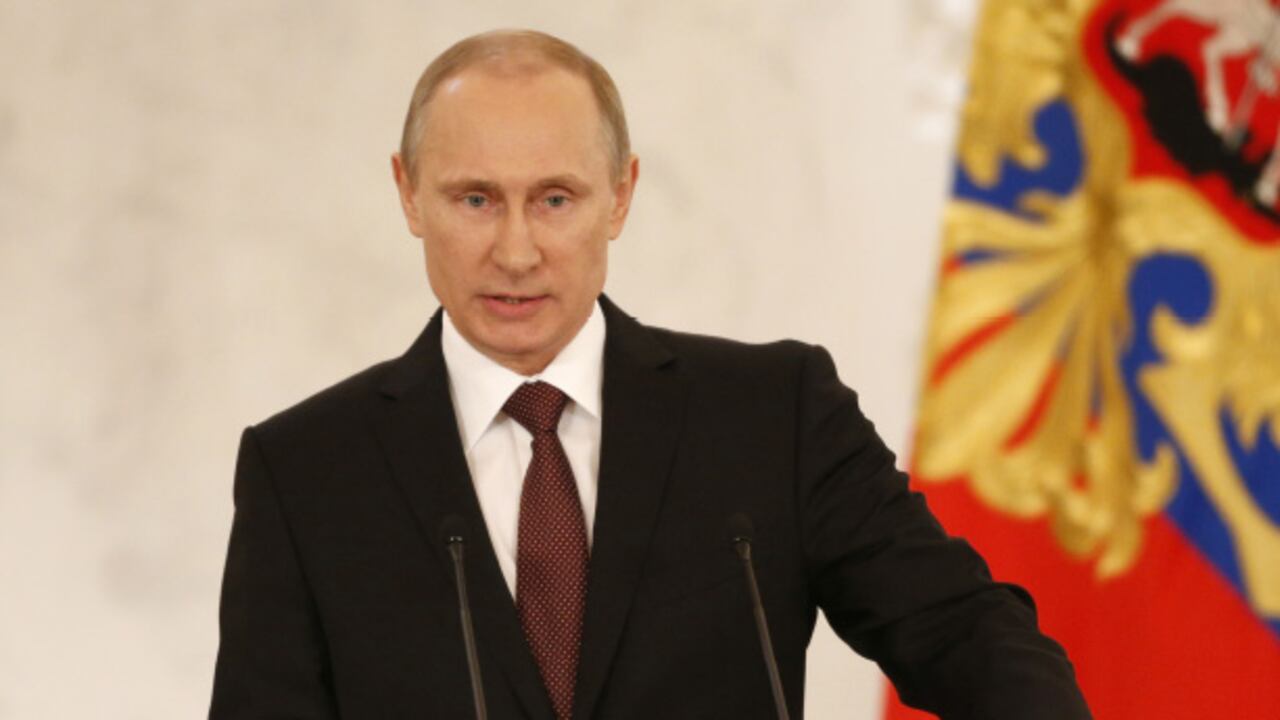 El presidente de Rusia, Vladimir Putin, anunció la anexión de Crimea en el Kremlin ante un público que lo aplaudió de pie.