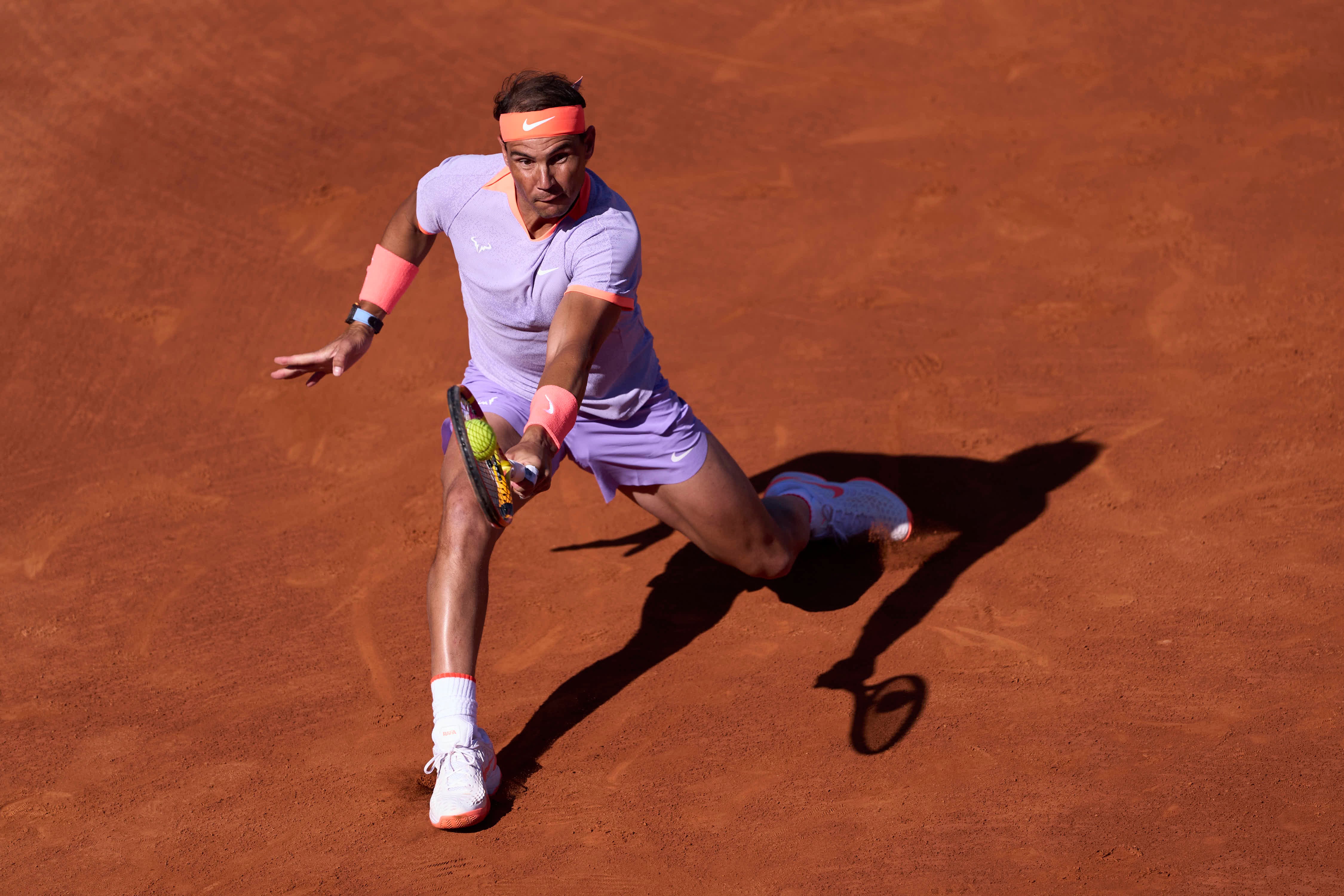 BARCELONA, SPAIN - APRIL 16: Rafael Nadal of Spain in action against Flavio Cobolli of Italy during their Men's Singles Round of 64 match on Day 4 of the Barcelona Open Banc Sabadell 2024 at Real Club De Tenis Barcelona on April 16, 2024 in Barcelona, Spain. (Photo by Pedro Salado/Getty Images)