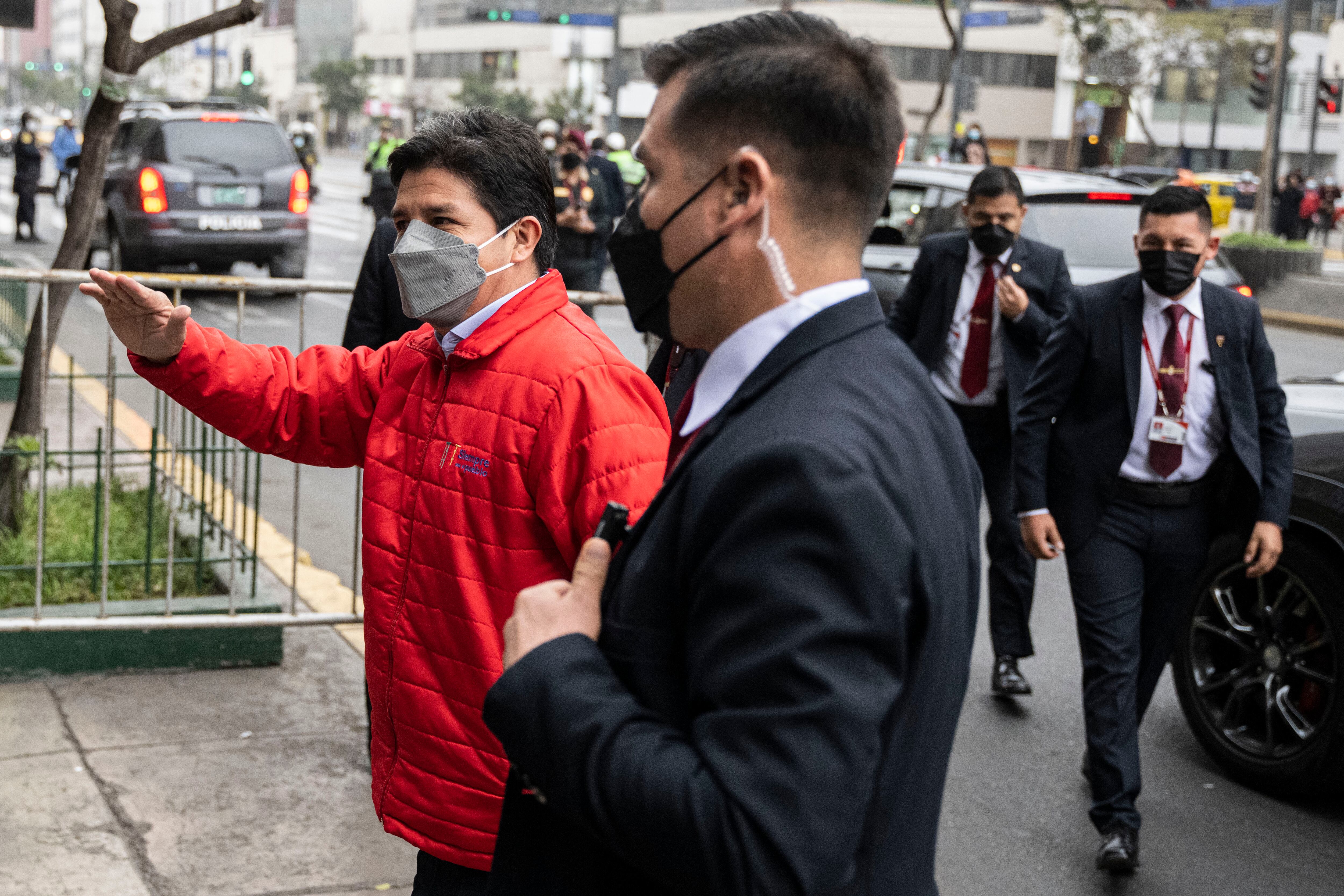 Peru's President Pedro Castillo arrives to the prosecutor's office building in Lima on September 5, 2022. - Peru's President Pedro Castillo and his wife Lilia Paredes are facing separate court hearings on Monday, accused by prosecutors of leading an alleged corruption network that operated from the government palace. (Photo by Ernesto BENAVIDES / AFP)
