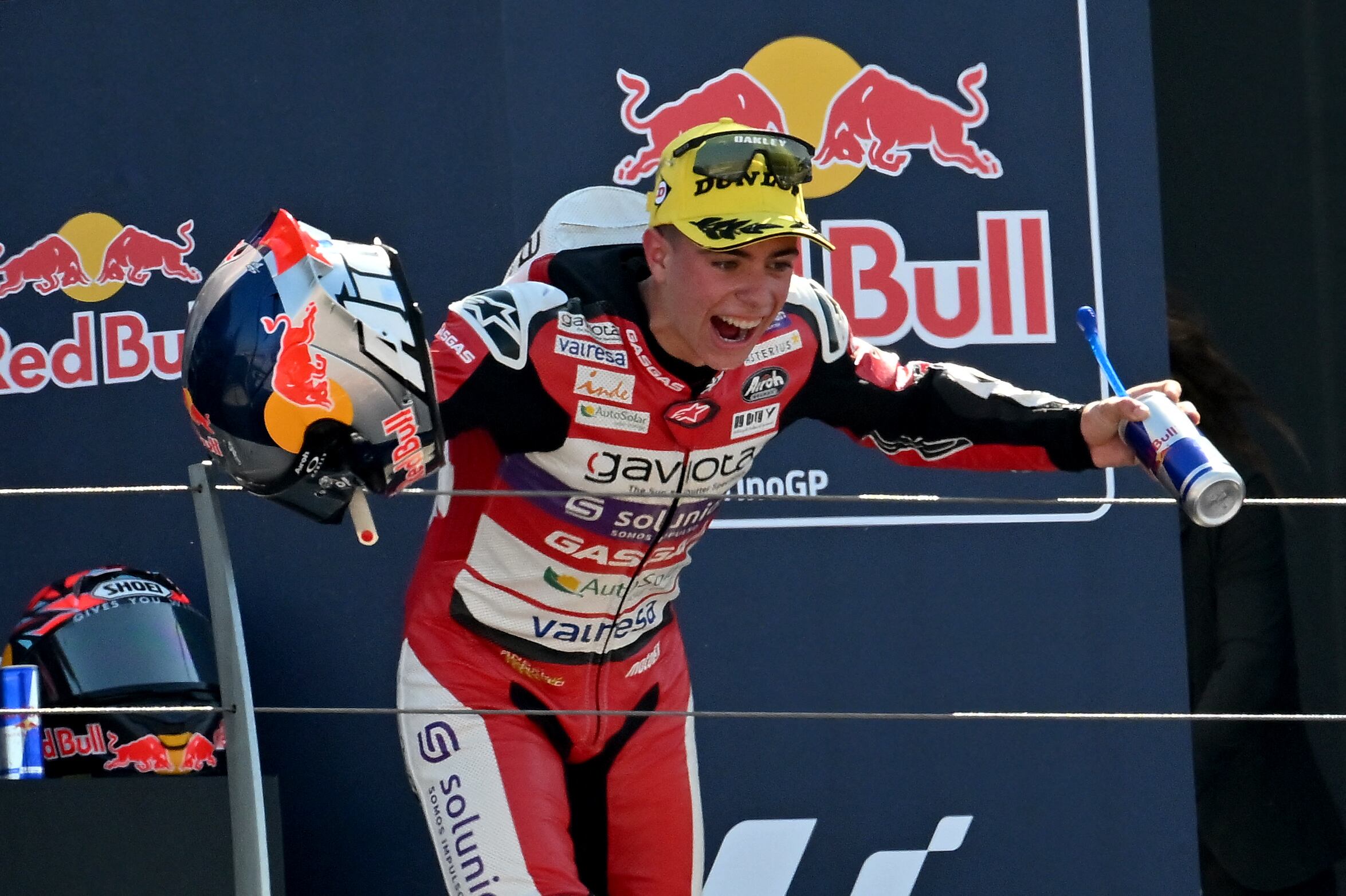 GASGAS Aspar Team Colombian rider David Alonso celebrates on the podium following the San Marino Moto3 at the Misano World Circuit Marco-Simoncelli in Misano Adriatico on September 10, 2023. (Photo by Filippo MONTEFORTE / AFP)