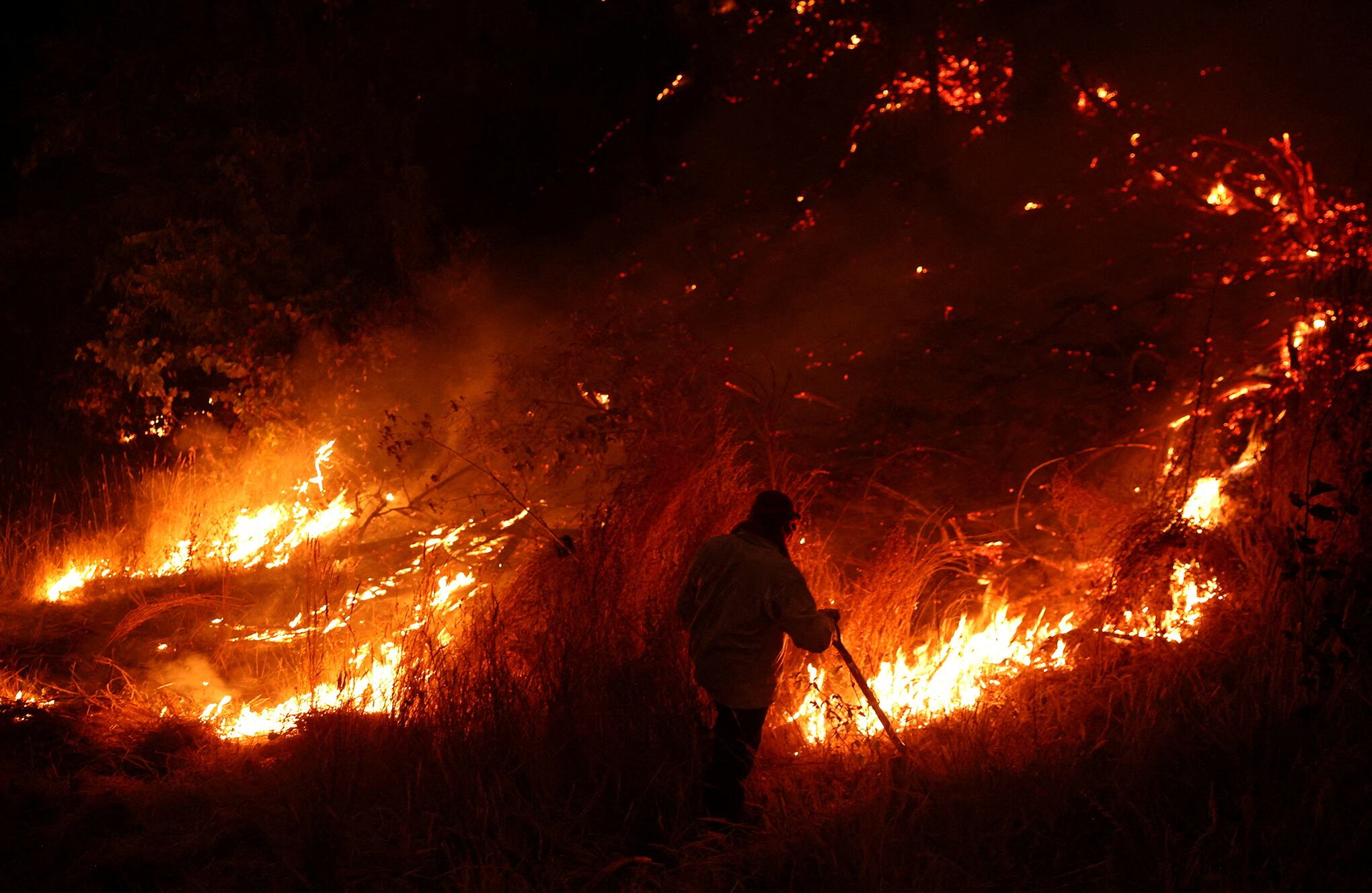 En imágenes : Chile lucha contra los incendios forestales más mortíferos registrados.