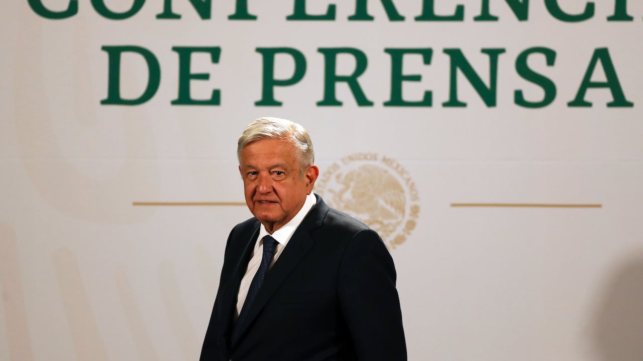 FILE - In this April 20, 2021 file photo, Mexican President Andres Manuel Lopez Obrador arrives to give his daily, morning news conference at the presidential palace in Mexico City. Lopez Obrador said on Aug. 5, 2021 that Mexico has accepted to host talks between representatives of the Venezuelan government and its opposition, with Norway as the mediator. (AP Photo/Fernando Llano, File)