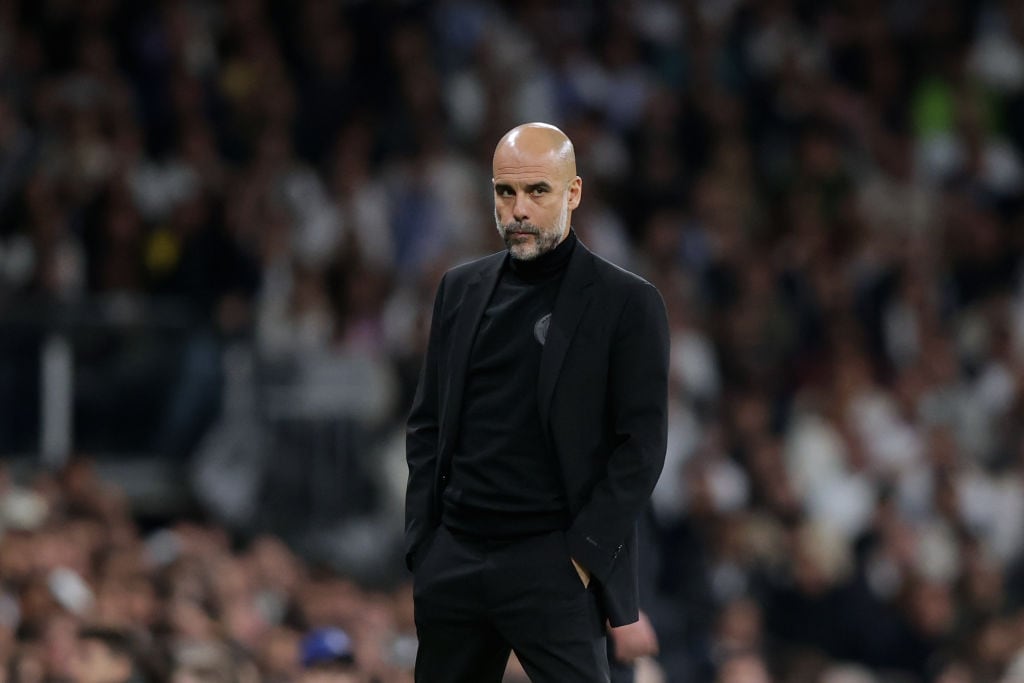 MADRID, SPAIN - APRIL 09: Manager Pep Guardiola of Manchester City FC reacts during the UEFA Champions League quarter-final first leg match between Real Madrid CF and Manchester City at Estadio Santiago Bernabeu on April 09, 2024 in Madrid, Spain. (Photo by Gonzalo Arroyo - UEFA/UEFA via Getty Images)
