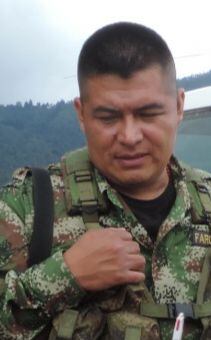 Alias de Cholinga o 'David', tras la muerte de alias Mayimbú y un reacomodamiento, es el cabecilla de la 'Dagoberto Ramos', que cuenta con cerca de 250 hombres en armas, así como redes de apoyo al terrorismo en cabeceras urbanas.