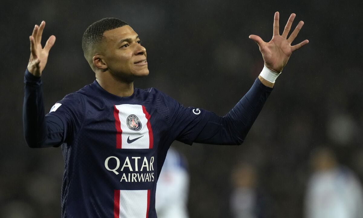 PSG's Kylian Mbappe reacts after missing a chance to score during the French League One soccer match between Paris Saint-Germain and Strasbourg at the Parc des Princes in Paris, Wednesday, Dec. 28, 2022. (AP/Thibault Camus)