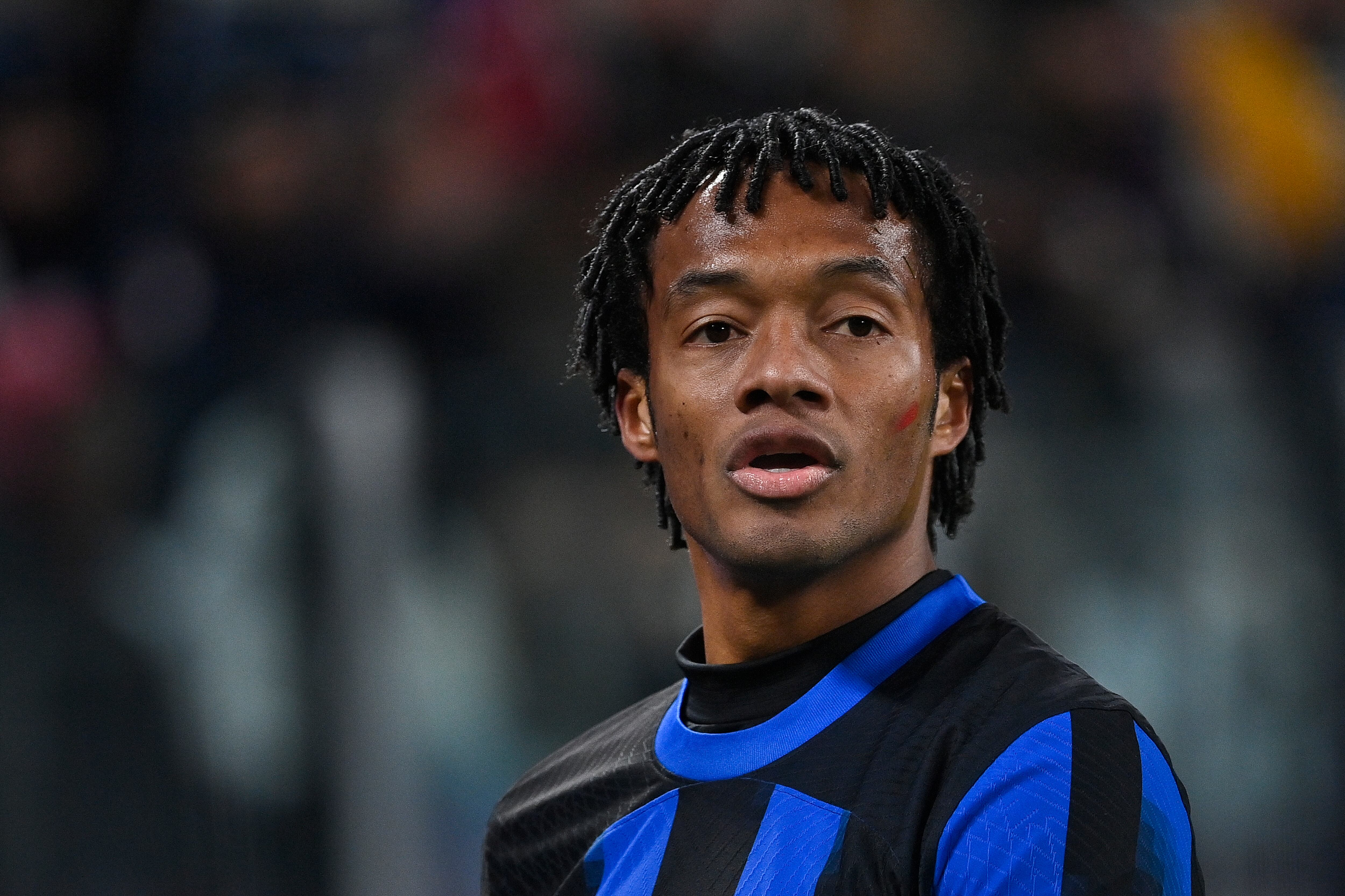 TURIN, ITALY - NOVEMBER 26: Juan Cuadrado of Internazionale FC  reacts during the Serie A TIM match between Juventus and FC Internazionale at Allianz Stadium on November 26, 2023 in Turin, Italy. (Photo by Stefano Guidi/Getty Images)