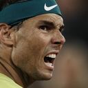 Spain's Rafael Nadal reacts after missing a point as he plays Serbia's Novak Djokovic during their quarterfinal match of the French Open tennis tournament at the Roland Garros stadium Tuesday, May 31, 2022 in Paris. (AP Photo/Thibault Camus)