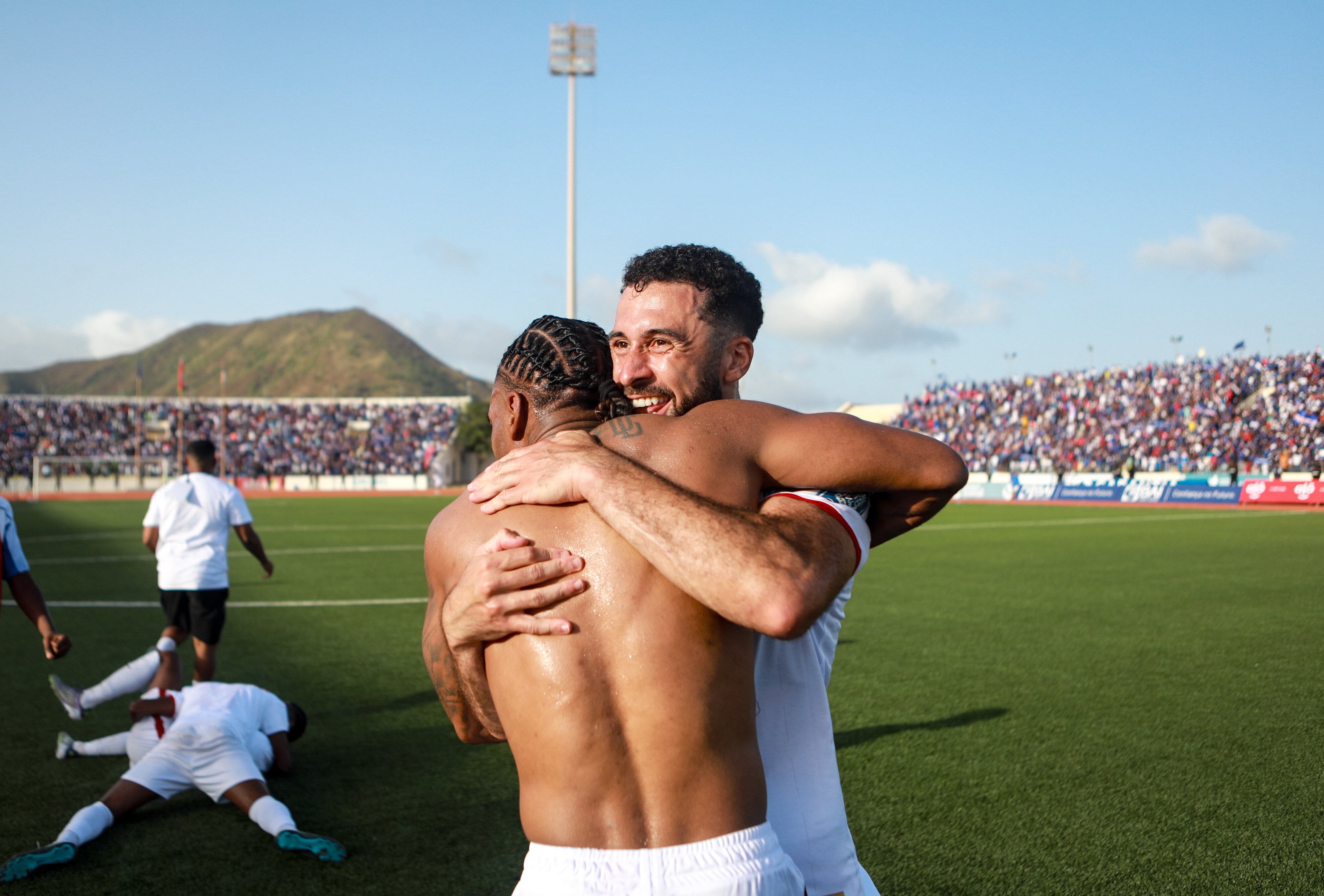 Praia , Cape Verde - 13 October 2025; Roberto Lopes, right, and Garry Rodrigues of Cape Verde celebrate their side's qualification for the 2026 FIFA World Cup after the FIFA World Cup 2026 African qualifying match between Cape Verde and Eswatini at Estádio Nacional de Cabo Verde in Praia, Cape Verde. (Photo By Cristiano Barbosa/Sportsfile via Getty Images)